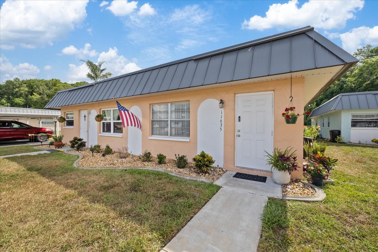 Welcome to this charming 55+ community in New Port Richey! This well-maintained 1-bedroom, 1 and a half bath condominium offers comfortable, low-maintenance Florida living in a convenient location. The home features a bright and inviting living area, a spacious bedroom, and a finished enclosed porch that provides the perfect space to relax, entertain guests, or enjoy your morning coffee.

Additional features include a covered carport, central air conditioning, a newer water heater and an efficient floor plan designed for easy living. Conveniently located near shopping, dining, medical facilities, parks, and Gulf Coast attractions, this property is ideal as a year-round residence or seasonal retreat.

Enjoy the benefits of maintenance-free living and an active lifestyle in this desirable 55+ community. Don’t miss this opportunity to own an affordable piece of Florida paradise!  Schedule your private showing today!