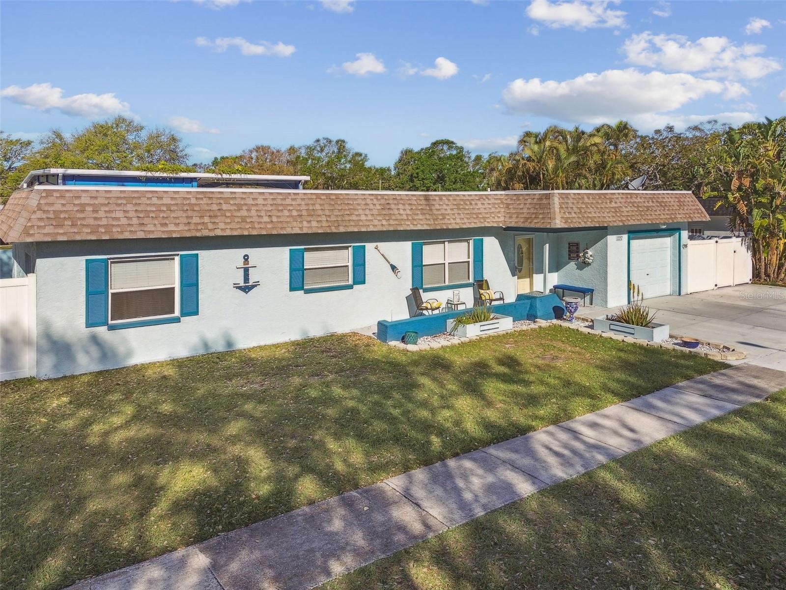 3 BEDROOMS, 2 BATHS, ONE CAR GARAGE Single Family Home! GREAT LOCATION! Close to the GULF BEACHES, Shopping Centers & Restaurants. As you enter this Spacious Home you can’t help but notice the Beautiful Glossy Porcelain Tile Throughout. The Open Kitchen has Stainless Steel Appliance, Granite Countertops, lots of Cabinet Space and a Breakfast Bar! The Large Family/Dining area off the Kitchen is perfect for entertaining with Family and Friends. The 2nd & 3rd Bedrooms have CEILING FANS! Large closets and big windows that let plenty of natural light in. The Hall Bath has Tile Surround and Glass Shower/Tub Doors. The LARGE MASTER BEDROOM has a ceiling fan, DOUBLE CLOSETS and En Suite Bath with Tile Surround Walk-in Shower and Glass Door. The One Car Garage has an Automatic Door Opener with Remote. Front Load Washer and Dryer AS IS! The large concrete back and side decks have a storage shed and sitting bench around the Oak Tree! The Privacy Fence has two Double Gates on each side of the property! Small Pet OK with a $350 Non-Refundable Pet Fee. Tenants are required to have renter’s insurance for their personal property and 300K liability with the owners as additionally insured. This is a MUST SEE!