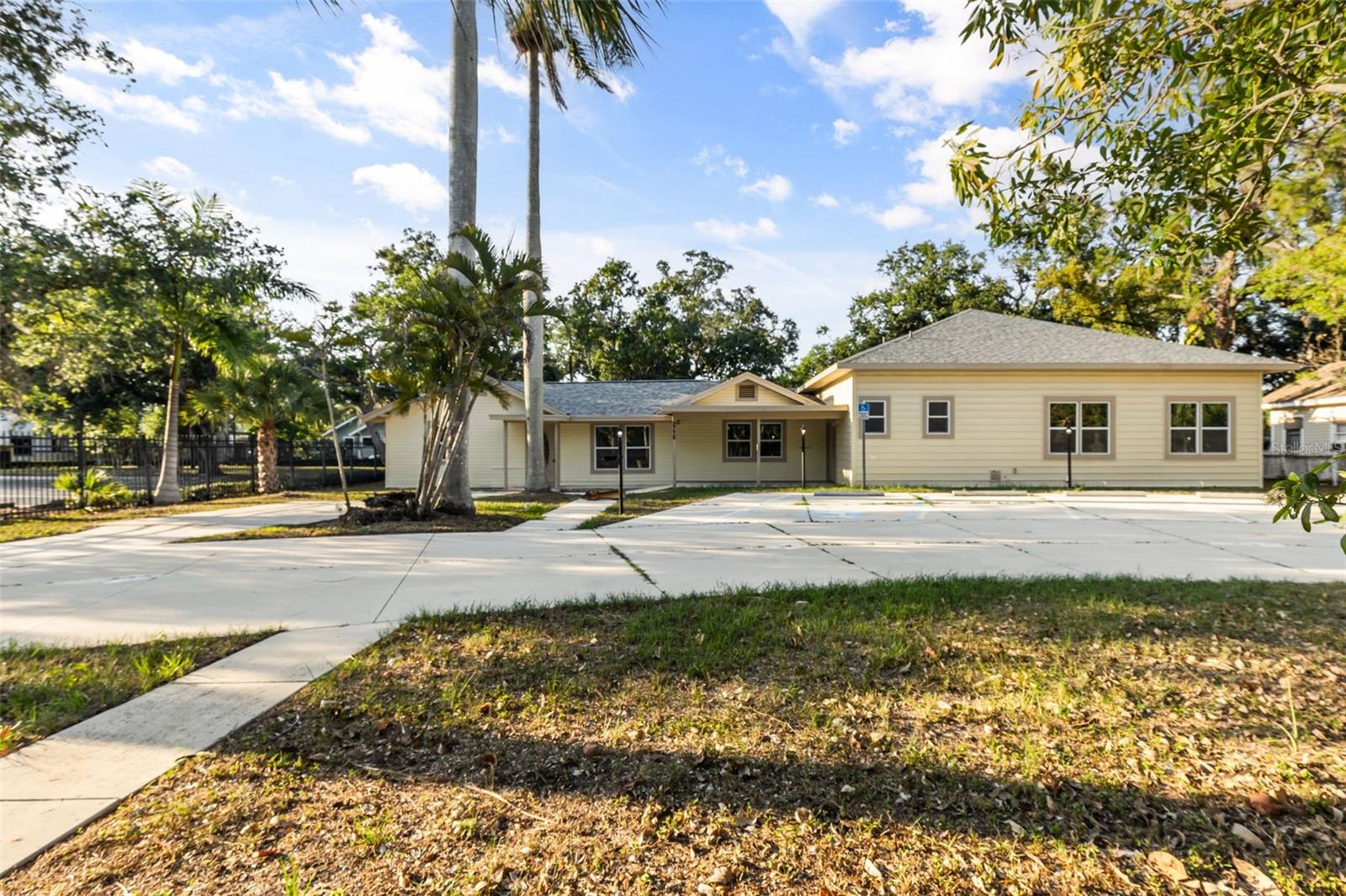 Rare opportunity to own a highly versatile mixed-use property just minutes from the Bradenton Riverwalk. This 4,420 SF building sits on an
oversized 0.4474-acre lot with valuable on-site parking and endless potential for owner-users, investors, or entrepreneurs. The property
features a spacious residential-style 4-bedroom, 2-bath section with kitchen and living areas, plus two large open commercial spaces with high ceilings and two ADA-compliant restrooms. Perfect for live/work use, office, studio, wellness center, rental income, retail, or multiple business concepts. Prime location near downtown Bradenton, Riverwalk attractions, dining, shopping, and major roadways. Flexible zoning, strong visibility, and a layout that is difficult to find in today’s market. Properties with this size, parking, and mixed-use potential rarely become available. Property is zoned mixed use and may allow residential, commercial, or live/work use. Buyers are advised to verify all zoning, permitted uses, and restrictions with the appropriate local municipality. All information recorded in the MLS is intended to be accurate but cannot be guaranteed, buyer advised to verify. Sold As-Is