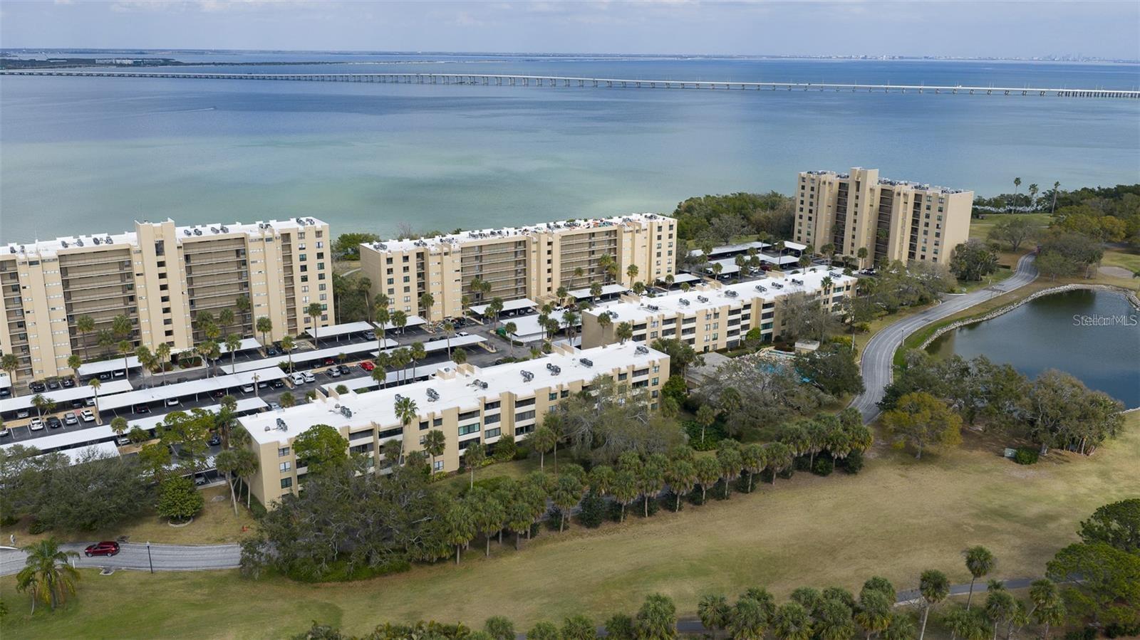 Welcome to the GATED community of Cove Cay! This beautifully updated FIRST-floor 1-bedroom, 1.5-bath condo offers 810 square feet of thoughtfully designed  AND FULLY UPGRADED living space with peaceful golf course views and an abundance of high-end upgrades. The bright, open floor plan features a spacious primary suite with a walk-in closet, a convenient half bath for guests, and an enclosed Florida room that's perfect for a home office, sitting area, or a relaxing place to enjoy your morning coffee.

The extensively RENOVATED interior includes upgraded electrical with a new breaker box and panel, PGT IMPACT WINDOWS, an impact-rated bedroom slider, new drywall and baseboards, a GrandAire split A/C system with Nest thermostat, luxury vinyl plank flooring with a vapor barrier, and a custom shiplap accent wall with added electrical. The beautifully remodeled KITCHEN showcases updated countertops, a large island with soft-close cabinetry, double-sided storage, and a pop-up receptacle, along with a dedicated coffee and beverage center featuring its own refrigerator. Premium Samsung APPLIANCES include a 36-inch counter-depth Smart refrigerator and Bespoke Smart electric range, while the laundry area is equipped with an LG washer and dryer in the newly finished utility room. Additional features include ceiling fans throughout and a slate-tiled patio.

Cove Cay offers resort-style amenities, including a community pool, golf course, marina access, and beautifully maintained grounds. Conveniently located near shopping, dining, major highways, Tampa Bay, and the Gulf beaches, this move-in-ready condo is ideal as a primary residence, seasonal retreat, or investment property. Don't miss this opportunity to enjoy maintenance-free Florida living in one of Clearwater's most desirable gated communities.