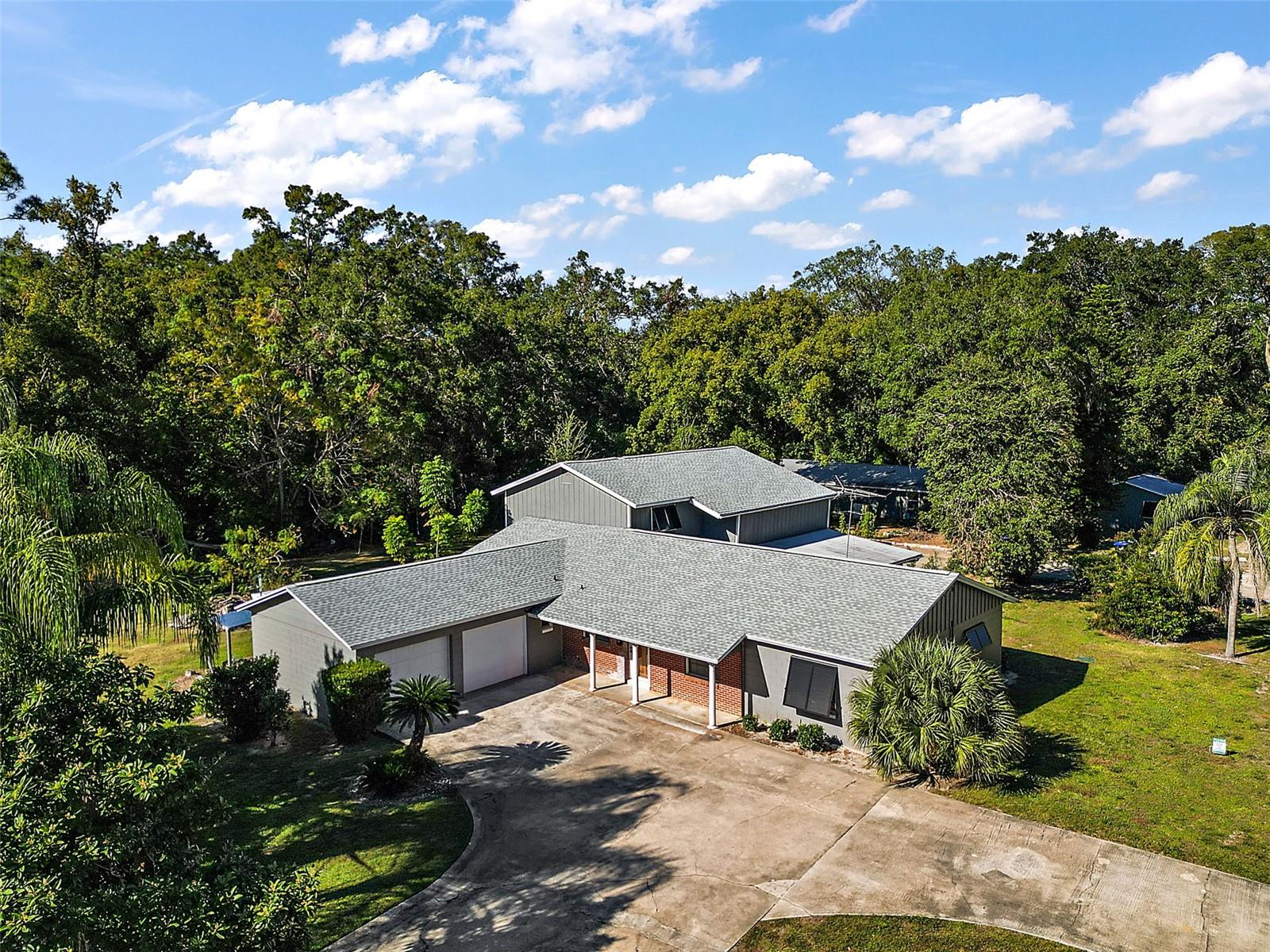 An exceptional investment opportunity awaits with this beautifully maintained, five-unit residential enclave. Nestled on a sprawling 1.27-acre lot, this rare multi-family compound combines immediate cash flow with significant upside, projecting a potential annual gross income of $100,000+.
The property has been thoughtfully upgraded for peace of mind, featuring a brand-new roof on the primary duplex, a newly installed drain field, a comprehensive electrical overhaul across all units, and a fully modernized community well system. A perimeter block wall ensures a sense of privacy and seclusion from the street for all residents.
The Residences Unit A: A charming, 400 sq. ft. standalone cottage offering 1 bed/1 bath ($1,000/mo) Units B & C: A classic duplex featuring two comfortable 2-bed, 1-bath units ($1,300/mo each) Unit D: A spacious 1,800 sq. ft. 3-bed, 2.5-bath home with a 2-car garage. Unit E: A matching 1,800 sq. ft. 3-bed, 2-bath retreat with a private carport,  Bonus Structure: An additional standalone 3-bay building offers incredible potential for owner storage or additional rental revenue.
With utilities (power and well water) included in the current structure and meticulously maintained grounds, this "turn-key" portfolio is a dream for the savvy investor looking for scale and stability or an all inclusive family compound!
