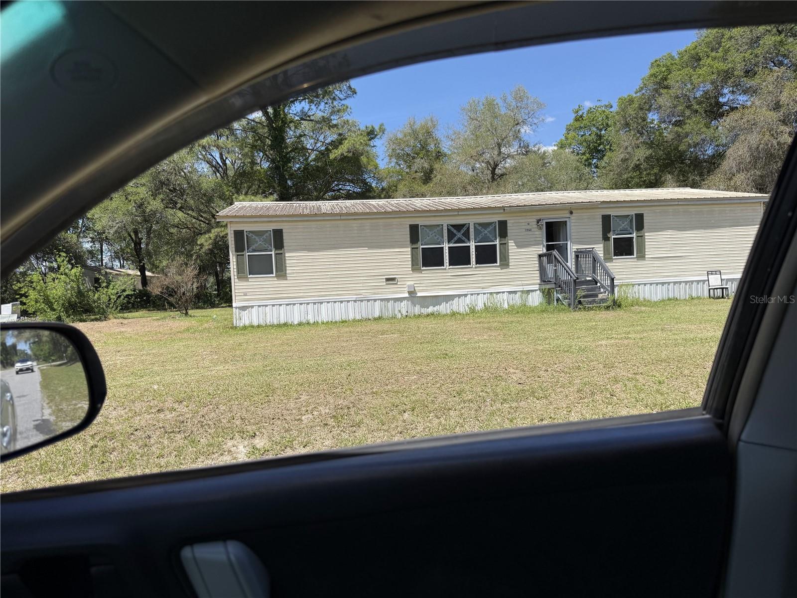 Looking for a Large Country Home? How About a Great Cap Rate Investment Property? This Great Home Is It! This 1.25 acre General Agriculturally Zoned Lot with a 4 Bedroom/2 Bath Manufactured Home is an awesome investment or perfect rural homestead. This home is minutes from the best Public Horseback Riding Trails in the State. Minutes to Ocala Shopping, Restaurants, and Medical Facilities. Easy Commute to I-75. This Home can be purchased alone or as part of a multiple property investment. Curently rented long term $1,035. This home will not last. This home is occupied.  Please do not disturb residents.