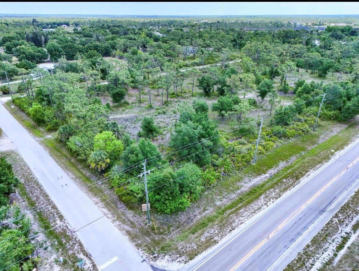 Discover the endless potential with this beautiful mulched 3.47 acre parcel. Despite its quiet surroundings you are only a short drive from everyday essentials, dining, and shopping. Located just miles from downtown Punta Gorda, you'll have easy access to waterfront restaurants, boutiques, and local attractions like fishing piers and boat ramps to enjoy those relaxing days. Easy access to main highways, along with paved roads on both sides of the property.