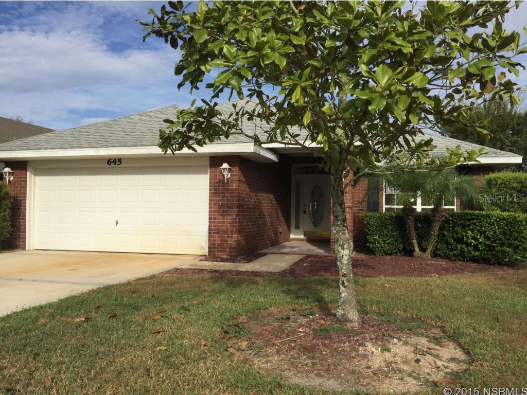 What an excellent opportunity on this solid brick lakefront home in the elegant Coral Trace subdivision.  Coral Trace is a fully secured subdivision with a community pool and clubhouse for residents. All of the homes in this community have been built in the last 10 years, most solid brick and the roads have elegant round abouts throughout. This home is an excellent opportunity being lakefront, having 4 bedrooms and 2 baths as well as an attached 2 car garage and screened in porch. The main living space has a great open kitchen with breakfast nook, designated formal dining space and large living room with vaulted ceilings overlooking the lake. The master suite is very private overlooking the lake with a private bath including a double sink vanity, garden tub and stand up shower.  Come see! ;Water: City