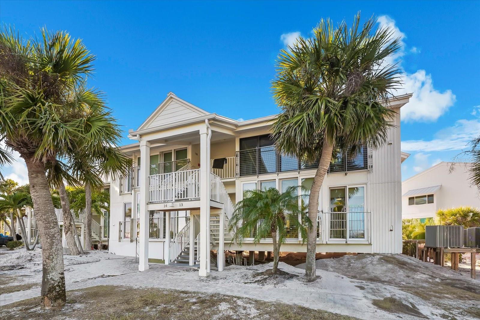 Wake up to the sound of waves, seabreezes, and seagulls in this beautifully updated 2-bedroom, 2-bath beachfront condo located directly on the sugar-sand beach of Boca Grande Island along the Gulf of America. This residence offers a front-row seat to breathtaking sunsets and endless coastal serenity, with the beach just steps from your door.

Enjoy resort-style living with all amenities included: a heated beachfront pool and spa, outdoor tiki bar, food and drink service at both the pool and beach, and an on-site restaurant for effortless dining. Additional community features include a fully equipped fitness center, tennis courts, scenic walking paths, and a children’s playground, creating a lifestyle that’s as convenient as it is luxurious.

Recent improvements provide peace of mind and modern comfort, including new 2025 foundation, new 2024 hurricane-impact sliding glass doors new 2025 roof, and new 2025 air conditioning systems. Whether you’re seeking a full-time residence, seasonal escape, or investment opportunity, this condo delivers unmatched beachfront living in one of Boca Grande’s most desirable locations.

Coastal, carefree, and completely turnkey—this is island living at its finest.