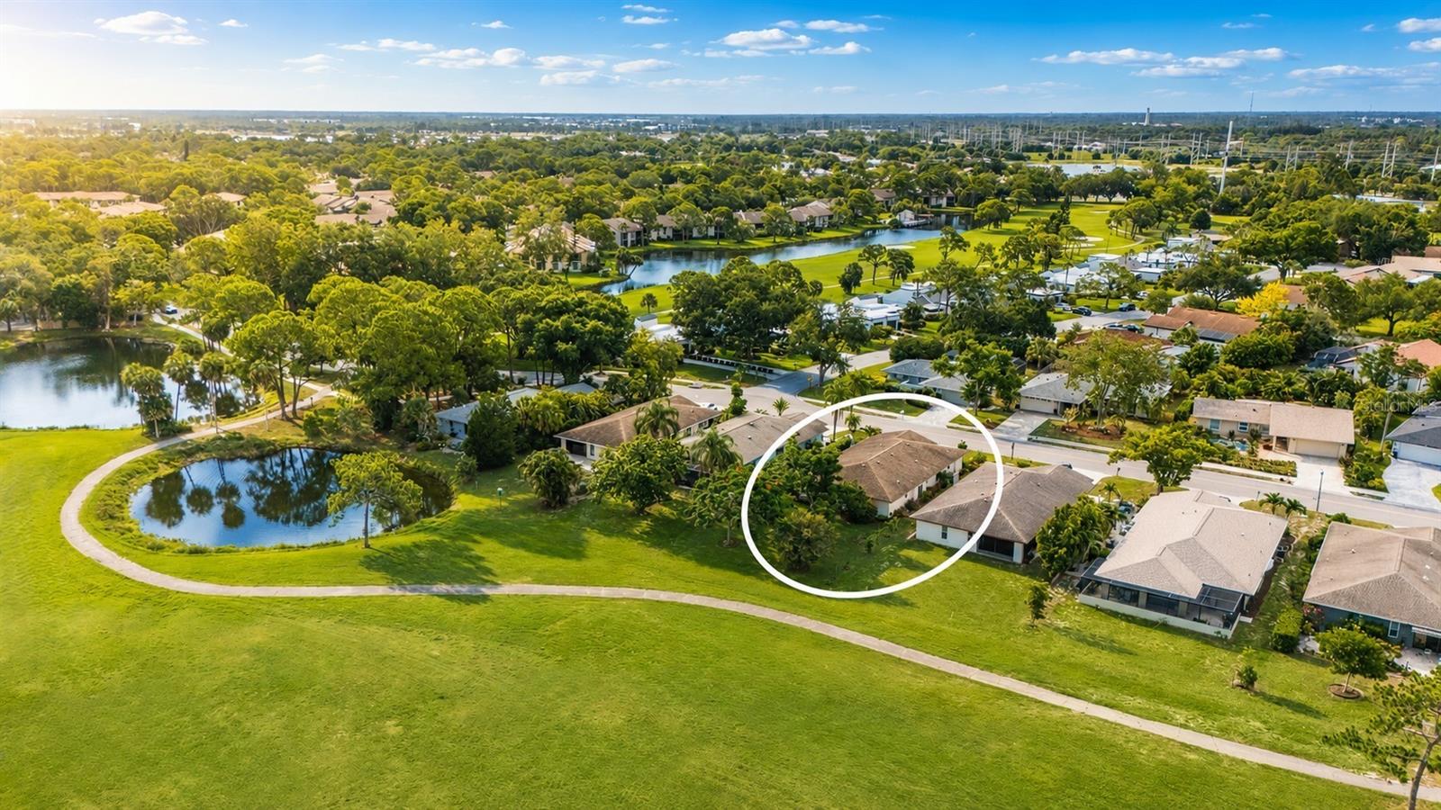 Virtually Staged. Gorgeous golf course views, beautiful updates and the peace of mind of hurricane-rated windows come together in this inviting home in The Meadows, a park-like oasis in a phenomenal location.
A paver driveway, colorful tropical blooms and charming front patio welcome you home. Inside, you’ll love the open, light-filled plan with oversized porcelain tile flooring, no popcorn ceilings, and a stunning custom Kirkplan kitchen featuring solid-maple soft-close cabinetry, a spacious island, Bradshaw quartz countertops, newer stainless-steel appliances and a travertine mosaic backsplash.
Hurricane-rated windows provide comfort, quiet and confidence, while the Florida room offers a perfect place to relax and take in tranquil golf course views framed by oak, mango, crepe myrtle and flamboyant royal poinciana trees.
All just two blocks from the ice-cream shop and a short ride to all the fun The Meadows has to offer. 
On 1,600 park-like acres, The Meadows is a resort-style community just 15 minutes from downtown. Enjoy 14 miles of scenic trails and access to a fitness center, Junior Olympic pool, pickleball, golf and Har-Tru tennis. You’ll be minutes to award-winning beaches, vibrant arts and culture, Whole Foods, Trader Joe’s, IKEA, Nathan Benderson Park, the Legacy Trail, Mote SEA Aquarium, the future Sarasota Orchestra, and University Town Center: a favorite shopping, dining and entertainment destination.
2023 A/C, newer appliances, 2013 30-year shingle roof, hurricane-rated windows throughout, above floodplain in zone X