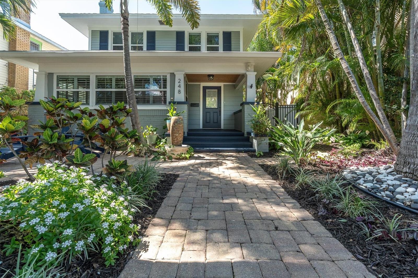 Welcome to this charming 4-bedroom, 3 FULL bathroom two-story Craftsman home located in the heart of Historic Old Northeast. On the first floor, you will find an entire light-filled, well connected living room, dining room, study/den, laundry room, and a versatile fourth room that can be used as a TV room or a bedroom as it has an ensuite full bathroom. The kitchen has porcelain tile floors, stainless steel appliances, and effortlessly ties into the dining room.  Take the wide staircase upstairs to discover 3 nice-sized bedrooms and 2 full bathrooms. One of those is the primary bedroom which features two closets and a large adjoining bathroom with dual sinks, a walk in shower and a jet tub.  When you pull up to the house, you are greeted with mature landscaping and a newly painted exterior in warm, inviting colors. Out back, you will find a brand-new, hurricane-rated 480-square-foot two-car garage equipped with A/C, along with an additional parking pad for a third vehicle and golf cart. To the side of the garage is a large patio featuring a completely rebuilt and fortified gazebo. You get complete peace of mind regarding climate comfort, as both main house A/C units were installed in 2024. On top of that, this home sits safely outside of a flood zone on high and dry ground.