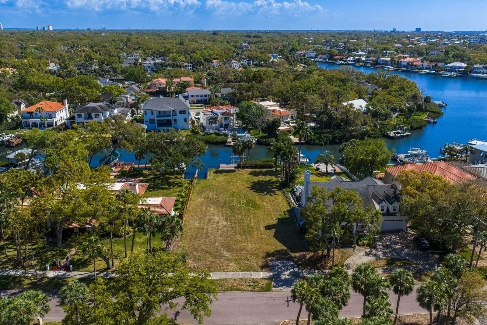 Exceptional opportunity to build a custom waterfront estate on a premier homesite in Beach Park set along a beautiful canal
and surrounded by luxury residences.