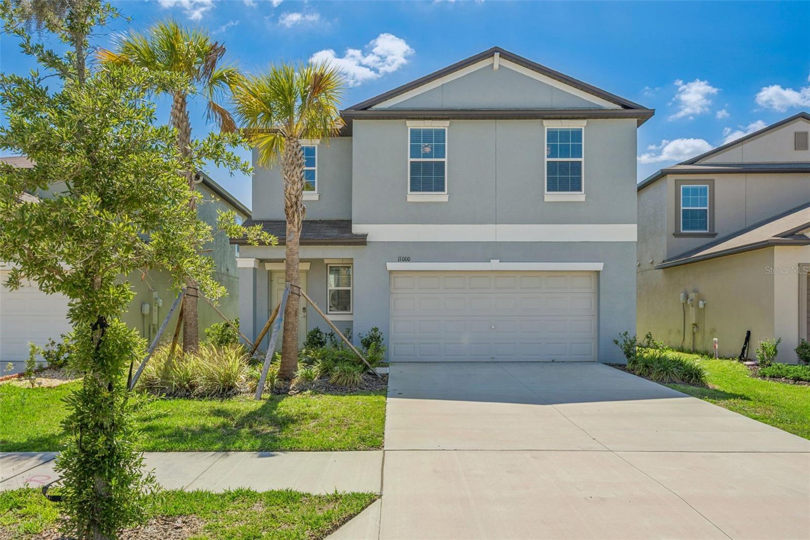 One or more photo(s) has been virtually staged. MOVE IN READY & LIKE NEW! 4-bedroom, 2.5-bath home with oversized 2-car garage is sure to impress! Offering 1,870 sq ft of meticulously maintained living space, this beautiful two-story home sits on a large private lot in the highly sought-after community of Mirada. Low HOA fees include cable and internet! Step inside and enjoy a modern open-concept floor plan filled with natural light, spacious living and dining area, plenty of room for entertaining family and friends. The kitchen is the heart of the home and offers abundant cabinetry, granite countertops, stainless steel appliances, a large center island, and pantry space perfect for everyday living and gatherings. Upstairs, the oversized loft provides endless possibilities for a game room, sitting area or second living area. The spacious primary suite offers a large walk-in closet, and a luxurious en-suite bath. Enjoy Florida living at its finest from your private backyard with plenty of room to relax, entertain, or enjoy evening sunsets. Located just minutes from I-75, shopping, Tampa Premium Outlets in Wesley Chapel and Wiregrass Mall, dining, entertainment, hospitals, and schools, Mirada offers an unmatched lifestyle. Residents enjoy access to the world-famous 15-acre Lagoon featuring crystal-clear waters, sandy beaches, kayaking, paddle boarding, swimming, swim-up bar, restaurant and resort-style amenities that create a true tropical paradise right in your own neighborhood. This incredible home offers the perfect combination of luxury, location, and lifestyle. Schedule your private showing today!