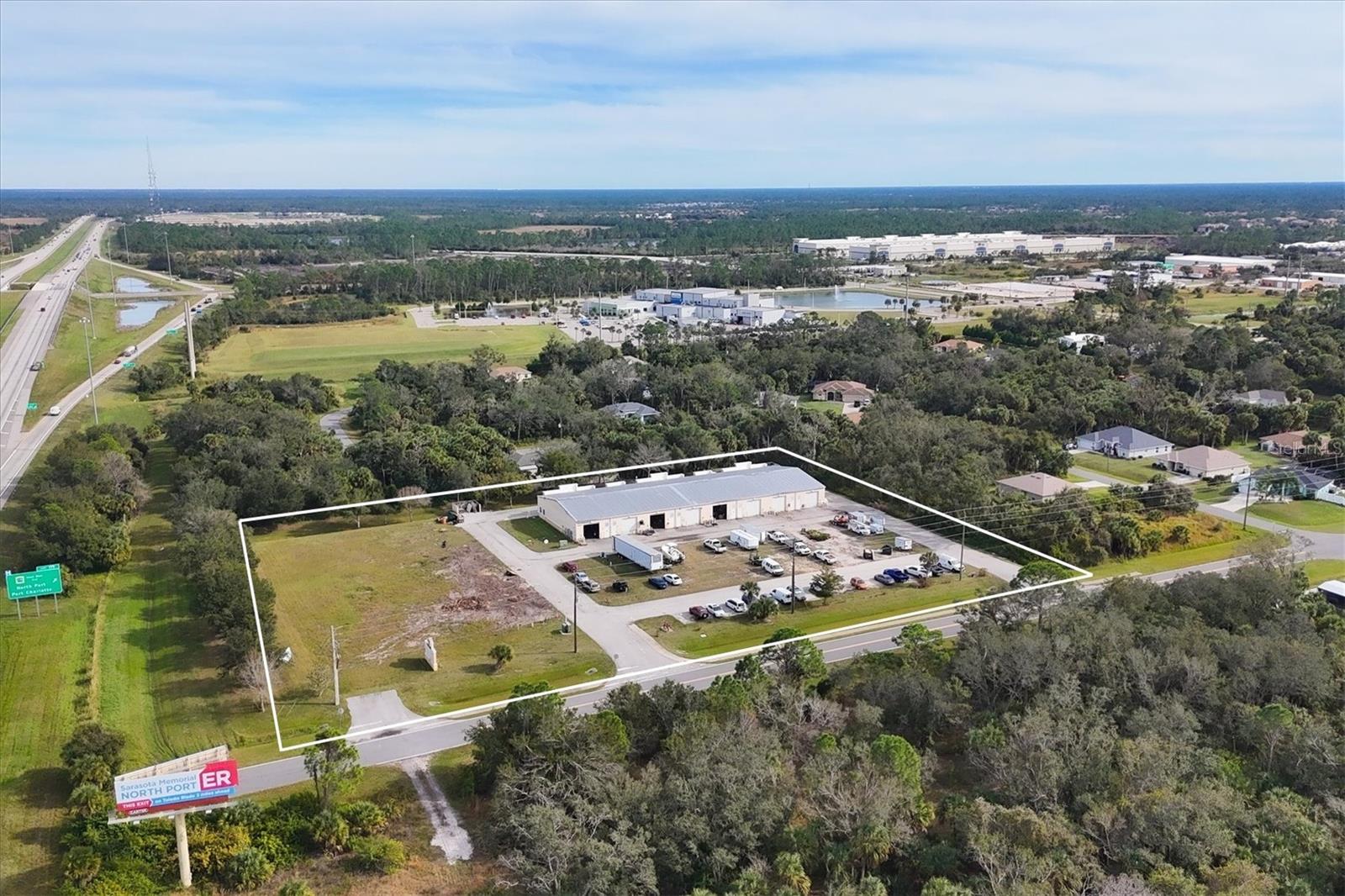 Recorded Sold Data for commercial warehouse building with 8 units on 4 acres and I-75 frontage.