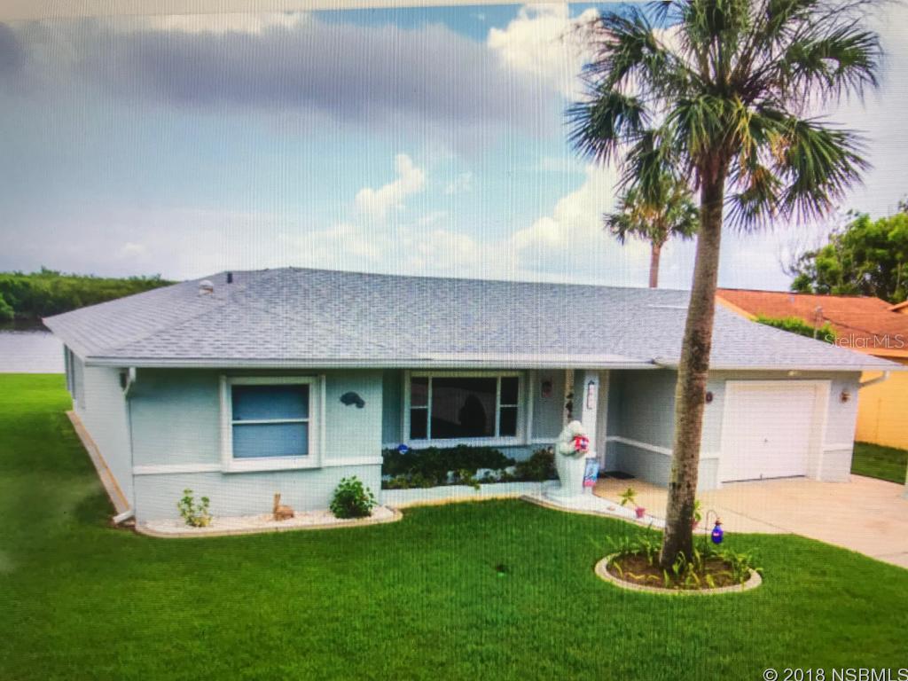 3BR/2BA with 65' of waterfront on river with dock.