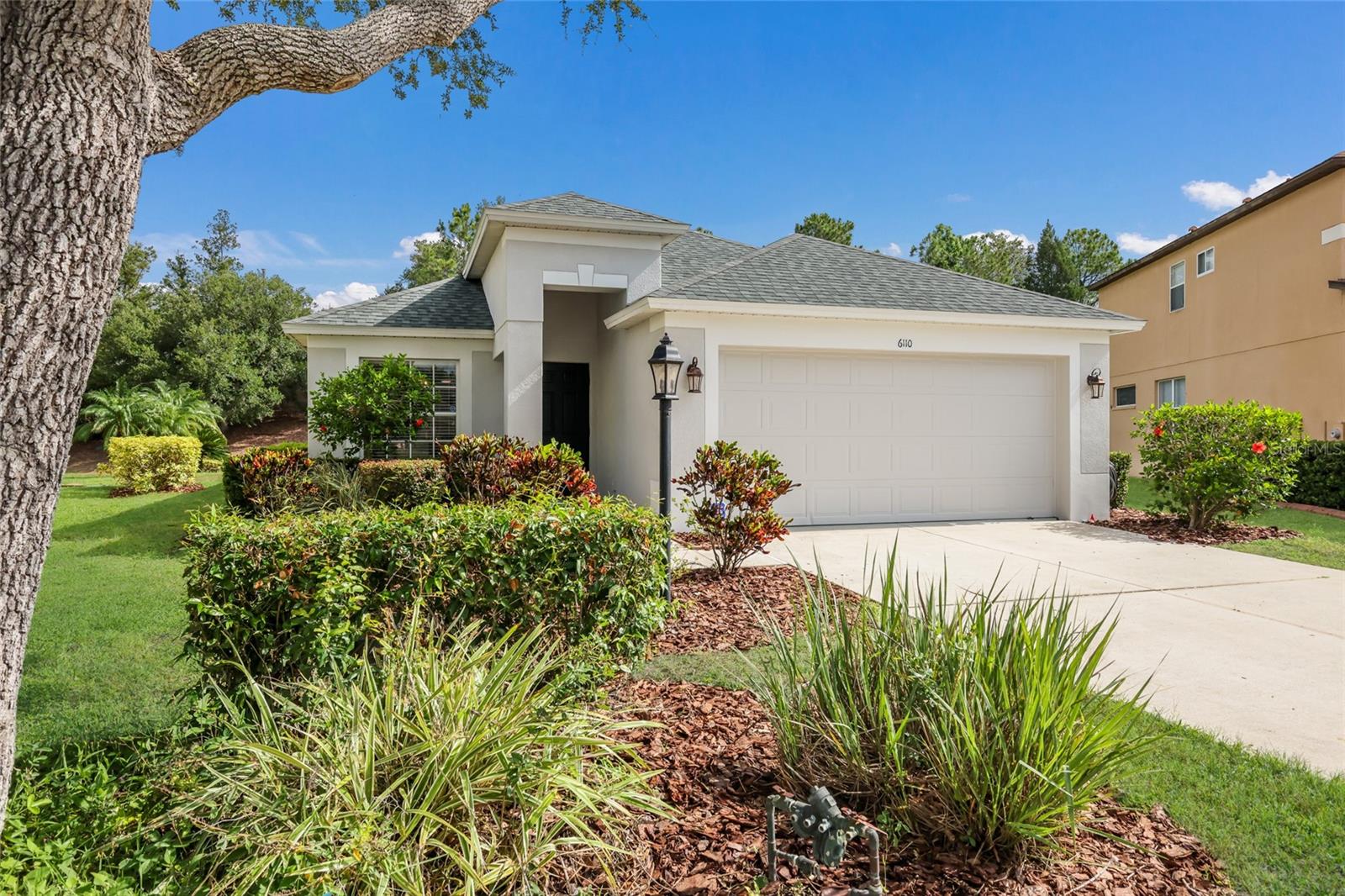 Privacy, thoughtful updates, an oversized lot, and an unbeatable Lakewood Ranch lifestyle await! Welcome to this beautifully updated Greenbrook residence nestled on a quiet cul-de-sac in one of Lakewood Ranch's most sought-after communities. Offering 3 bedrooms and 2 bathrooms, this well cared-for home blends comfort, style, and exceptional value.  As you enter you are immediately greeted by a bright and cheerful dine-in kitchen featuring white wood cabinetry, gorgeous Fantasy Brown leather-finished granite countertops, and a full suite of stainless steel appliances, all updated within the past five years. The thoughtfully designed floor plan showcases newer flooring throughout, including plush carpeting in the bedrooms and a combination of luxury laminate wood-look flooring and immaculate porcelain tile throughout the main living areas.  The guest bathroom has been completely renovated, while other major investments by the current owner include a NEW ROOF, NEW HVAC, and NEW WATER HEATER—which will provide peace of mind and lower insurance rates for years to come. Step outside to enjoy a large, private backyard with no rear neighbors, offering exceptional privacy and the opportunity to ADD A FENCE if desired. Whether relaxing, entertaining, or creating your dream outdoor oasis, the possibilities here are endless. Perfectly positioned just one mile from the highly desirable, A-rated McNeal Elementary School, this exceptional home is your opportunity to live in a community renowned for its beautiful parks, top-rated schools, recreation, and incredibly low HOA fees of just $121 per year.