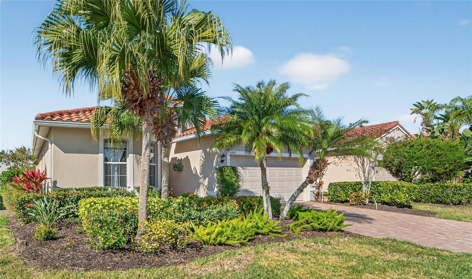 Discover refined living in this exquisite 3 bedroom, 2 bathroom home nestled within the prestigious
Cascades, a 55+ gated community.  This meticulously maintained 1,804 sq ft residence boasts private garden views from a 236 sq ft glass enclosed temperature controlled sunroom with custom window treatments, offering an idyllic Florida retreat for a total of 2,040 sq ft. Enter through the custom hurricane glass front door into a sunlit foyer that flows into a spacious, freshly painted living area. The cozy family room and large updated kitchen create a seamless space for entertaining, with sliding glass doors revealing an air conditioned sunroom perfect for reading, relaxing and informal dinning. 
The kitchen features freshly painted cabinets, lustrous granite countertops, and plenty of  cabinetry. A formal dining room sets the stage for memorable gatherings with loved ones, savoring your finest culinary creations. The primary suite is a sanctuary of comfort, featuring generous walk-in closets. 
A separate guest bedroom ensures comfort and seclusion for visitors, while an additional guest room can be converted to a bonus sitting room or office space. 
Cascades redefines active adult living with its newly renovated 25,000-square-foot clubhouse, featuring a heated indoor-outdoor pool,
six Har-Tru tennis courts, two pickle ball courts, a state-of-the-art fitness center, and a banquet hall. Engage in vibrant community life with bocce ball, horseshoes,
pickleball, arts and crafts, pottery classes with two kilns, and an array of social clubs and activities orchestrated by a full-time Tennis Pro. From card games and yoga to travel clubs and aerobics, there’s something for every interest. Located minutes from the
pristine beaches of Siesta Key, Lido Key, and Longboat Key, Cascades offers easy access to crystal sands and turquoise waters. Downtown
Sarasota, a mere 15-minute drive, brims with cultural treasures, including The Asolo Repertory Theatre, Ringling Museum, Selby Gardens, and
the Van Wezel Performing Arts Center. Enjoy fine dining, art galleries, and shopping at St. Armands Circle, UTC Mall, Whole Foods, and Fresh
Market. Top-rated healthcare and Sarasota International Airport are also conveniently nearby. Community Benefits. Cascades is free of CDD fees
and includes lawn maintenance and partial plant care, ensuring a low-maintenance lifestyle within a welcoming, secure gated community.
Embrace the elegance and ease of this exceptional home, where luxury and leisure converge

Schedule your private showing and explore the potential of Cascade living.