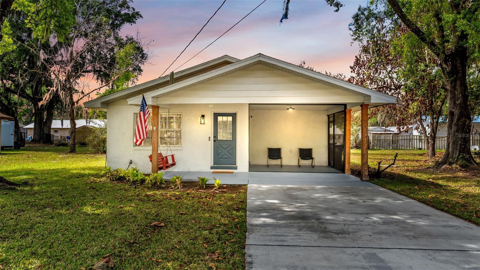 Located in the charming and historic community of Fort Meade—Polk County’s oldest city—this inviting 2-bedroom, 1.5-bath home offers a blend of modern updates and small-town appeal. The nicely updated kitchen features stainless steel appliances, granite countertops, a tile backsplash, and soft-close cabinetry and drawers, creating a functional and stylish space for everyday living. The full bathroom has been refreshed with new ceramic tile, while luxury vinyl flooring flows throughout the main living areas, with carpet in the primary bedroom for added comfort. Major updates include a roof and A/C system both replaced in 2018, providing peace of mind for years to come. Enjoy relaxing mornings or evenings on the 10x12 screened front lanai, perfect for taking in the quiet surroundings. Additional features include an outdoor laundry area and a manageable footprint ideal for low-maintenance living. Nestled in a community rich with history and charm, Fort Meade offers a peaceful lifestyle with convenient access to the nearby Peace River with parks, trails, and outdoor recreation, plus Central Florida attractions like Bok Tower Gardens, LEGOLAND, Streamsong Resort, and other Polk County attractions. Beaches on both coasts and Orlando’s world-renowned destinations are all within a reasonable drive, making this an ideal location for those seeking a relaxed atmosphere and accessibility.