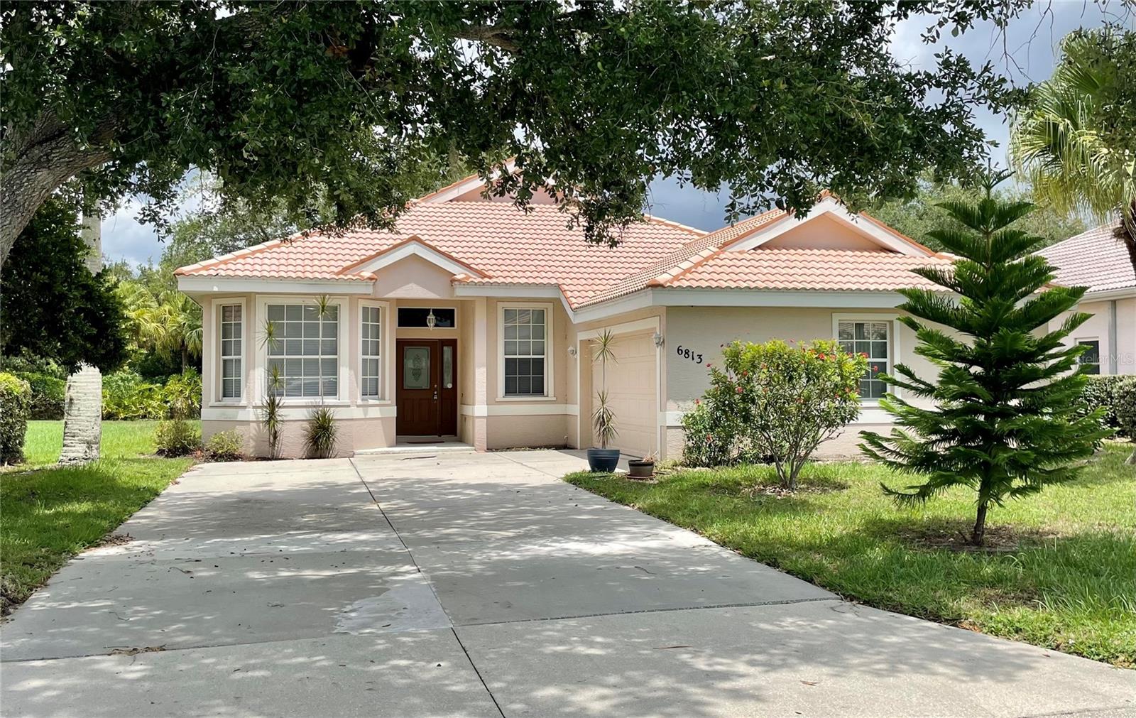 Opportunity awaits in the highly desirable Chaparral at Mote Ranch!  Nestled in one of the area's most sought-after communities, this 3-bedroom, 2-bath home with a 2-car garage offers an exceptional chance to create your dream home in an unbeatable location.  The open floor plan features a dedicated den/office just off the front entry, a spacious kitchen with a sunny breakfast nook and beautiful windows, an adjacent dining room, and a comfortable living room with sliding glass doors that open to a covered, screened lanai—perfect for enjoying Florida's year-round lifestyle. The primary suite and additional bedrooms provide a functional layout, while the inside laundry room adds everyday convenience. While the home is ready for updating and personal touches, its solid layout and outstanding location make it a fantastic value with endless potential. Residents of Chaparral at Mote Ranch enjoy low HOA fees and wonderful community amenities, all just minutes from I-75, the UTC shopping and dining district, Mote Aquarium, and an abundance of restaurants, shopping, and everyday conveniences.  SELLING AGENT IS RESPONSIBLE FOR VERIFYING ANY HOA, UTILITIES,ROOM SIZES, & ALL OTHER MLS INFO.