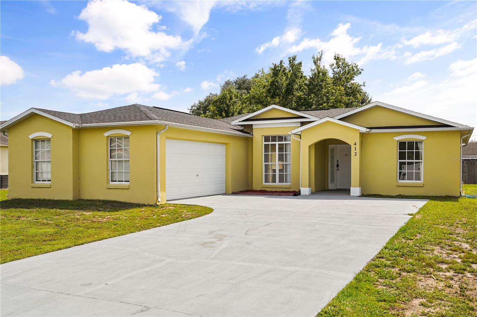 Rare find in Poinciana / Kissimmee: a 3-bedroom, 2-bathroom home where the big-ticket items are already done. This property comes with a brand-new roof, a new HVAC system, and fresh interior and exterior paint — meaning the major mechanical investments are behind you. Your budget and creativity can go straight toward finishing touches and personal style, not big-ticket repairs.

Built solid with block-and-stucco construction, this single-story home offers a functional floor plan across roughly 1,457 square feet of living space. Enjoy a spacious living room, a separate dining area, and a kitchen with a closet pantry — ideal for everyday living and entertaining. The primary suite is a standout, featuring a private en-suite bath with dual sinks, a garden tub, and a separate walk-in shower. Set on a low-maintenance, zero-lot-line homesite with covered parking for two, this is an easy-to-own layout with great bones and real upside for the right buyer.

Yes, it needs a little TLC — and that's exactly the opportunity. Whether you're a first-time buyer with a creative vision, a homeowner ready to customize, or an investor seeking a value-add project, this is an affordable entry point into one of Central Florida's largest and most established communities. Poinciana offers a notably low HOA, community pools, an aquatic center, parks, and convenient access to Valencia College's Poinciana campus and HCA Florida Poinciana Hospital. Commute with ease to the Orlando-area job market  while staying close to nature preserves and the Lake Marion Creek conservation lands.

Affordable homes with major upgrades already completed don't last long in this market. Schedule your private showing today and bring your vision to life in a home you can truly make your own.