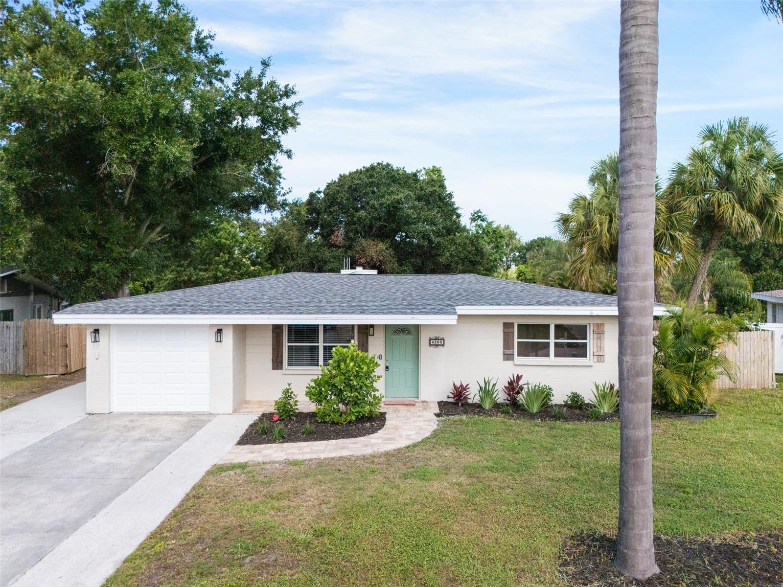 Welcome to 4200 Des Plaines Drive, Sarasota, FL, where timeless Florida charm meets thoughtful modern updates in the highly desirable South Gate Ridge community. This 3-bedroom, 1-bath home offers comfortable living space and presents an exceptional opportunity for first-time homebuyers, seasonal residents, investors, or anyone seeking an updated Sarasota home with no HOA restrictions.

Enhanced with numerous recent improvements, the home features a bright and inviting interior highlighted by durable tile flooring throughout, dark quartz kitchen countertops, and ceiling heights ranging from 8 to 10 feet that create an open, spacious feel. Stylish wood beam accents, recessed lighting, updated ceiling fans, and new sliding glass doors add character and functionality while maintaining the home's welcoming atmosphere.

The kitchen serves as the heart of the home, offering ample workspace and contemporary finishes, while the updated bathroom features white quartz countertops that elevate the space. A BRAND-NEW ROOF provides valuable peace of mind for future ownership.

Step outside to enjoy a fully fenced-in backyard designed for both relaxation and entertaining. The brick paver patio extension and continued tile flooring create a seamless indoor-outdoor flow, making the outdoor living space feel like a natural extension of the home. A spacious 13' x 7' x 8' storage shed offers excellent flexibility for tools, hobbies, lawn equipment, or additional storage needs.

The updated landscaping brings the backyard to life with a vibrant collection of tropical and ornamental plantings, including Bird of Paradise, Crotons, Areca Palms, Hibiscus, Plumbago, Ti Plants, and other Florida-friendly greenery, creating a lush and colorful outdoor setting that can be enjoyed year-round.

Conveniently located near shopping, dining, medical facilities, parks, and world-famous Gulf Coast beaches, this Sarasota property offers easy access to everything that makes the area one of Florida's most sought-after destinations. Whether you're looking for a primary residence, vacation home, or investment property, 4200 Des Plaines Drive combines location, updates, and value in one attractive package.

Schedule your private showing today and discover the possibilities this Sarasota home has to offer.