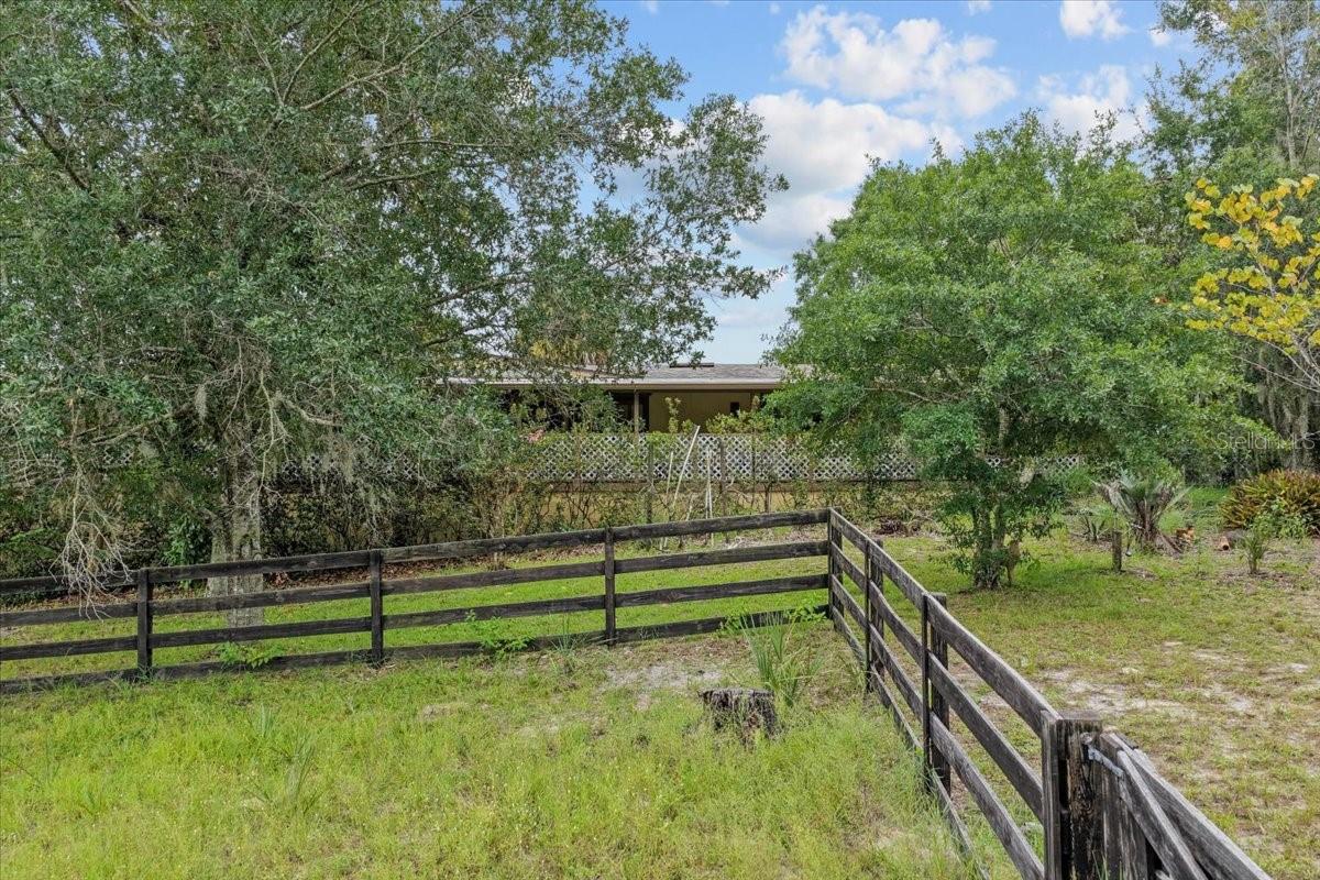 This agricultural/greenbelt property has been a family farm for DECADES! A manufactured home 3/2, a guest/studio 1/1, plus newer A/C (2 years), roof (4 years), leafless gutters, over 5 acres cleared and beautiful!!! Just on the outskirts of Barony Woods. Close to shops/restaurants in the area, the Suncoast Expressway with only 45 min to Tampa Airport, the beaches. Interior pictures coming soon.