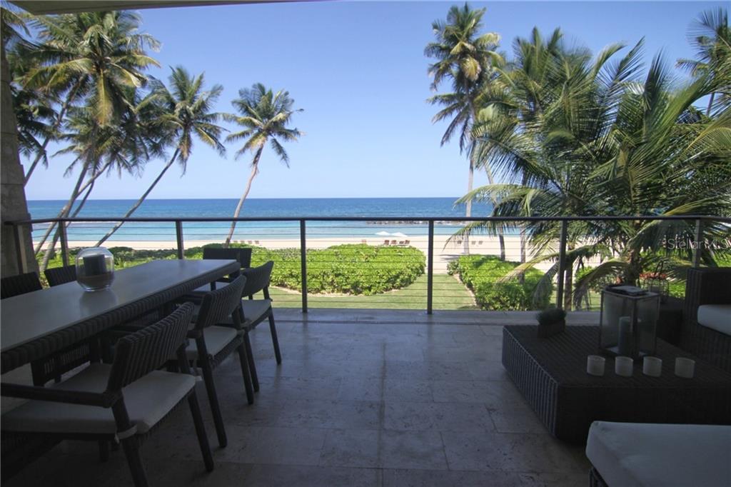 At this exquisite and exclusive West Beach apartment, a Ritz Carlton Reserve Residence, you will enjoy stunning sunset views and a spectacular golden sands beach every day!! Unwind in a beautiful landscape filled with sunshine, golfing and outdoor leisure where the possibilities to create ever-lasting memories are endless… 
This luxury unit is located within the gates of the legendary Dorado Beach Resort in Puerto Rico, a sought-after exclusive place with almost two miles of beach front, and the exclusive service of Ritz-Carlton Reserve. It is a fabulous opportunity to become the owner of a spacious and elegant beach front property with high end quality finishing that is located on the beach Laurence Rockefeller chose 50 years ago. 
This beach front residence features 2 bedrooms, Media room, 3 bathrooms, open kitchen design, living-dining room, laundry room, owner’s closet, media room, two covered shower patio areas, covered terrace, golf cart parking space and garage for one car. 
• Fully equipped gourmet kitchen 
• Fully furnished and equipped 
• Spacious balconies overlooking the ocean 
• Open floor plan 
• Exclusive concierge service with a dedicated residential management team to attend to your every need. 
• Owners also receive membership in the Dorado Beach Club. Membership includes access to four Robert Trent Jones Sr. designed golf courses, the 8,000 sq foot Fitness and Wellness Center, several dining venues, and The Watermill, a $12 million aquatic park.