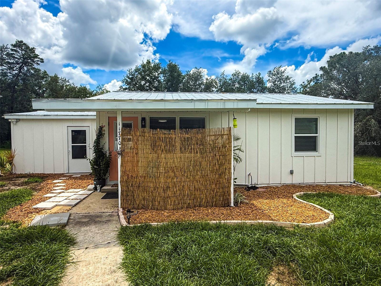This beautifully updated 2-bedroom, 1-bath home is a fantastic opportunity for investors, weekend adventurers, or anyone looking to make it their primary residence. Located just 1 mile from the Withlacoochee River boat ramp and only 2 miles from the crystal-clear waters of the Rainbow River, this property offers prime access to nature, kayaking, tubing, and all kinds of water activities.

The laundry room provides an additional 200 square feet of space, perfect for extra storage or added functionality. The fully fenced backyard offers plenty of room for animals, boats, and recreational toys. Conveniently located near dining, shopping, and entertainment, this home is ideal as an Airbnb, vacation retreat, or full-time residence.
