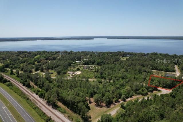 BRING ALL OFFERS! 1 acre buildable LOTS! Discover the epitome of Florida living on this vacant lot just moments from the shores of Lake Lochloosa. Home to some of the best fishing in Florida and so much more... Positioned mere minutes from Gainesville, home to the esteemed University of Florida, and within easy reach of Ocala, this parcel of land offers both convenience and tranquility. Other lots for sale. Please reach out for a VIP tour or for more details.