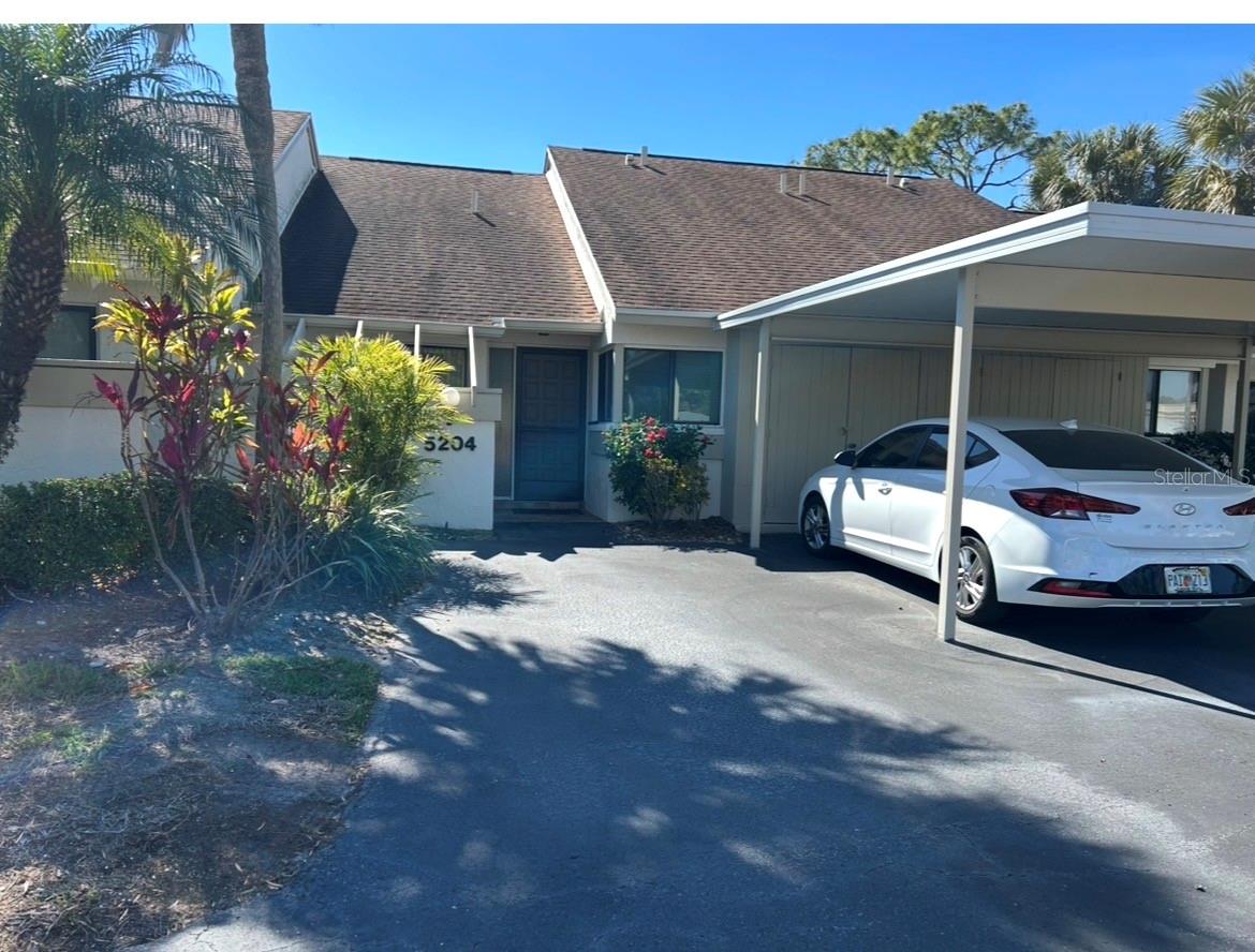 This move-in-ready villa offers effortless Florida is located within The Meadows, an active outdoor lifestyle community.. Steps from one of the community pools, walk to the pool from your Lanai, or sip your morning cup of coffee looking out to the pool. This condo offers both privacy and access to everything that makes The Meadows. The property is partially furnished, including kitchen utensils. The split-bedroom floor plan offers privacy and flexibility, with a private primary The main bedroom has a walk-in shower. The Meadows has a 1,650-acre park-like community with over 14 miles of trails, lakes, and an optional membership to golf, tennis, pickleball, and a fitness center. Just minutes from shopping and dining,  downtown Sarasota, and the beaches of Siesta Key and Lido Key. Perfect for that seasonal owner or year-round resident.