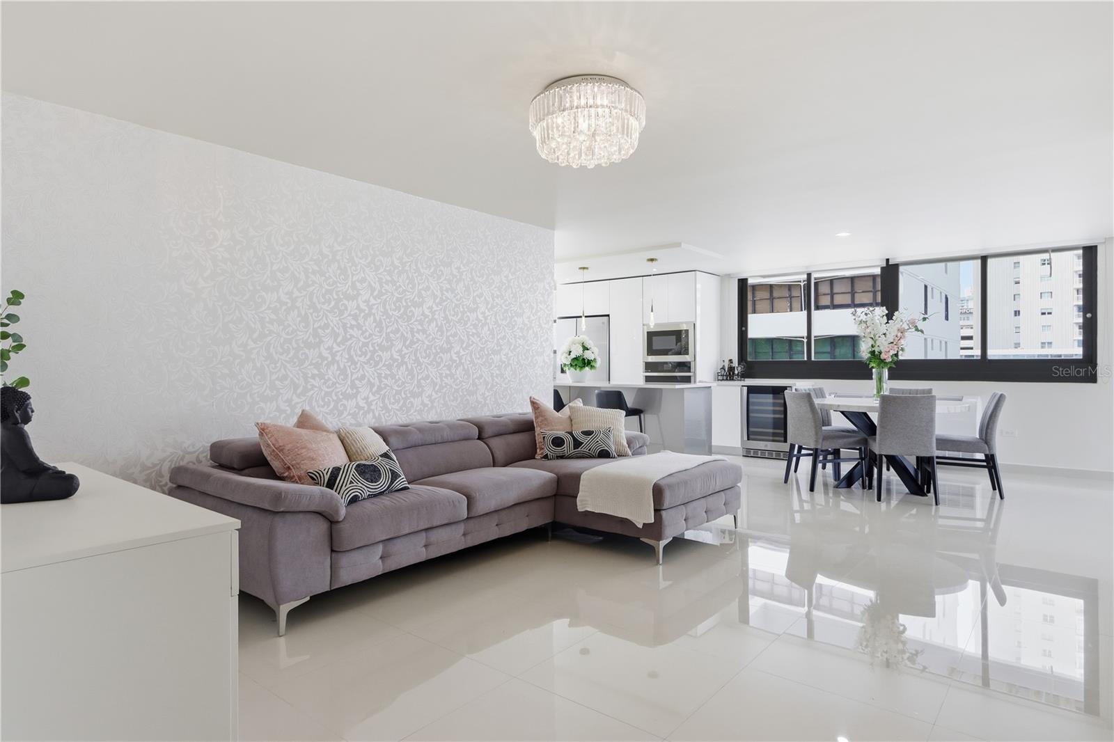 Experience elevated coastal living in this beautifully remodeled 3-bedroom, 2.5-bath apartment on the first floor of St. Mary's Plaza, one of Condado's premier addresses. Fully furnished and move-in ready, this stylish apartment features an open-concept layout and sleek modern kitchen with ocean views. Residents enjoy 24-hour security, a full generator, water cistern, pool, and direct beach access. Steps from the sand, top schools, restaurants, and boutiques this residence offers the perfect blend of comfort, style, and convenience in the heart of Condado.