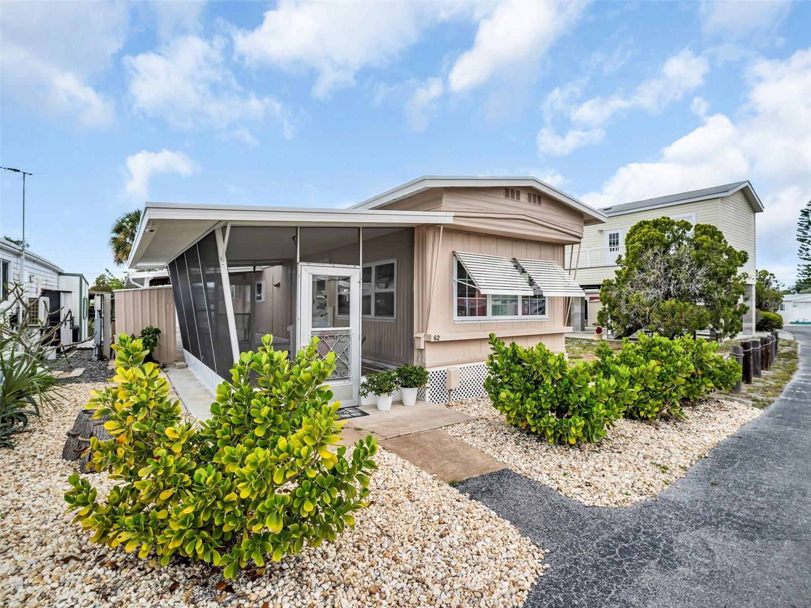 Welcome to easy Florida living in the desirable waterfront 55+ community of Chesapeake Point! This charming 2-bedroom, 1-bath mobile home offers an open and bright floor plan with a spacious living room and kitchen designed for comfortable everyday living and entertaining. Enjoy a slight water view right from the living room, bringing a touch of coastal serenity indoors.

Recent updates provide peace of mind and value, including two brand new mini-split AC units (2025), new refrigerator, new range (2024), new plywood floors, and a freshly painted exterior. Step outside to relax in the screened lanai—perfect for enjoying the Florida breeze year-round. A storage shed adds extra convenience for tools, bikes, or beach gear.

For boating enthusiasts, boat slips are available for $8,000 with a 30-year lease, offering Gulf access and endless opportunities for fishing, island hopping, and waterfront adventures. Shared seawall. Best of all, the co-op fee is included in the sale price.

Located in vibrant Tarpon Springs, you’ll be close to charming restaurants, unique shops, festivals, beaches, water sports, rich heritage, and the famous Pinellas Trail with miles of paved trails for walking, biking, and exploring. Don’t miss this affordable opportunity to enjoy the Florida waterfront lifestyle!