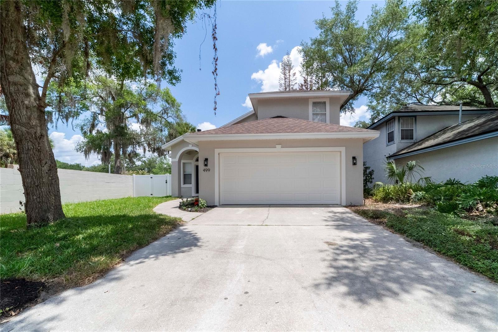 Location, Location, Location.  Welcome to your new home in Maitland!  This conviently located gated community home is a charming dwelling place featuring a cozy fireplace to uplift the ambiance of your living space. The home benefits from a tasteful neutral color paint scheme throughout, providing a welcoming canvas for your interior design aspirations. The kitchen is a cook's paradise, complete with a natural gas range, a stunning accent backsplash that truly makes the room pop and new applicances. Enjoy the luxury of a generous walk-in closet in the primary bedroom, perfect for all your storage needs. The primary bathroom offers the convenience of double sinks, making morning routines smooth and efficient. The shower in the primary bathroom add an opulent touch to your personal spa-like retreat. Relax or entertain with ease with a patio for outdoor gatherings. The fenced-in backyard promises privacy for all your outdoor activities. The home benefits from a newer roof, new AC, new hot water tank, ensuring peace of mind for years to come. The appeal of the property is enhanced by fresh interior paint and fresh exterior paint to the entire home. The comfort features continue with new flooring throughout, ensuring all areas of the home are updated. Take advantage of this home's remarkable attributes and turn this dwelling place into your personal sanctuary.  Some pictures virtually staged.