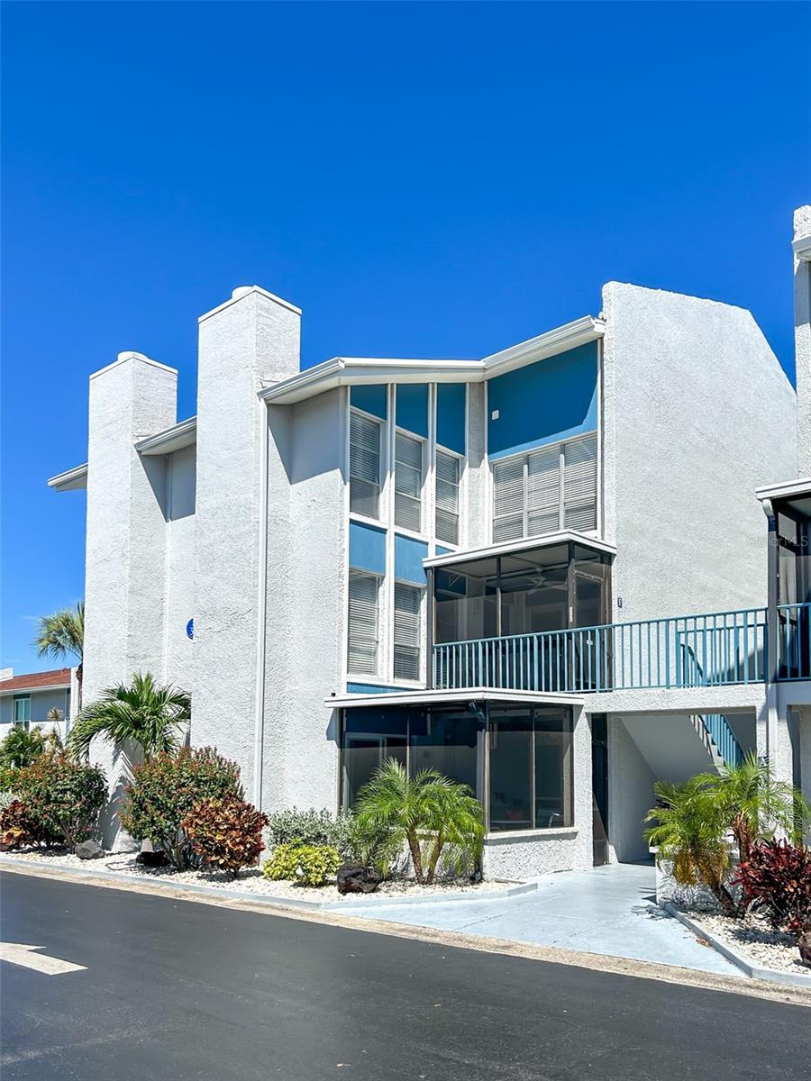 RARE opportunity to own this 2BR/1.5BA townhome-style condo with deeded BOAT SLIP in the gated waterfront community of Madeira Beach Yacht Club (MBYC). This is turn-key income-producing rentals that is also located on the 2nd floor for a peace of mind! Just steps from the Gulf of Mexico and offering 7-day minimum rentals, this property is ideal as a vacation home, primary residence, or income-producing investment. Deeded boat slip w/ lift, water, and electric Enjoy a private patio for sunset views, plus 4 fishing piers, 2 heated pools, clubhouse with gym, sauna, billiards, hot tub, and more. Walk to Madeira Beach, ROC Park, dining, shopping, and entertainment. Just 2 miles from John’s Pass Village. Don’t miss this opportunity—schedule your showing today!.