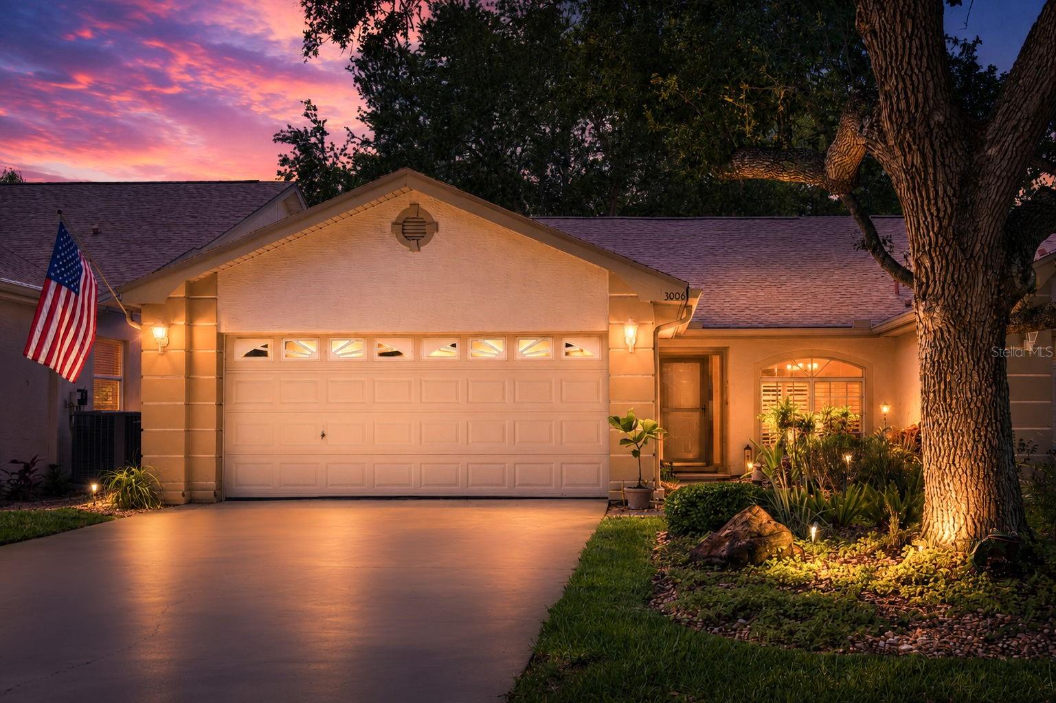 Welcome to 3006 Covewood Place, one of the prettiest streets in the desirable community of Brookfield. Situated in the Countryside area of Clearwater and so convenient to all that anyone could ask for. There are 2 community pools both with hot tubs, and the smaller pool is heated. In addition are 2 lighted tennis courts and pickleball courts for evening play. The clubhouse amenities for residents includes a full kitchen, large meeting/social room, washrooms and access to the community pool, spa and tennis courts.. The more than affordable HOA fee of $325. includes roof replacement/repair, exterior painting, trash, front yard lawn care, rear fencing, preventative subterranean bait system and treatment, if needed, front yard irrigation, rear yard is owner's responsibility, and all the great community features. And while the community amenities are impressive the real standout is the villa itself. In addition to the 1,680 square feet of living space, the home features a bonus room complete with a mini-split system providing both heat and air-conditioning. The measurement of this bonus room has an additional 233 sq. ft. not included in the heated/cooled sq. footage. This room could be used as a home office, media room, sitting area, your choice, it's your bonus room! There is a walk-in closet and linen closet in the primary bedroom and an en-suite bathroom features a soaking tub with separate walk-in shower, dual vanities, with granite countertop, The additional bedrooms share a full bath with tub and shower. There is a spacious indoor laundry room with stackable washer/dryer, plenty of cabinets for storage and countertops for folding. The kitchen was updated in 2021. Bright and inviting it is very functional, has neutral tones, soft closed cabinetry, and a granite countertop for a lovely modern feel. The 2021 GE appliance package adds both convenience and efficiency. The vaulted ceiling enhances the spaciousness offering space for a cozy bistro table. Designed with storage in mind this abundant space keeps everything organized. This charming villa offers beautiful curb appeal with 3 mature shade trees (1) front and (2) rear. The backyard is fenced creating a private outdoor setting. Here are some specs: Roof 2024, HVAC 2022, Hot Water Heater 2023, Bonus/Sunroom with Impact Windows/Door, and Mini-Split 2021. The open living room, dining area floor plan has high vaulted ceilings creating an airy atmosphere designed for everyday living and easy entertaining. A seamless flow. Schedule your appt. today, you will not be disappointed.