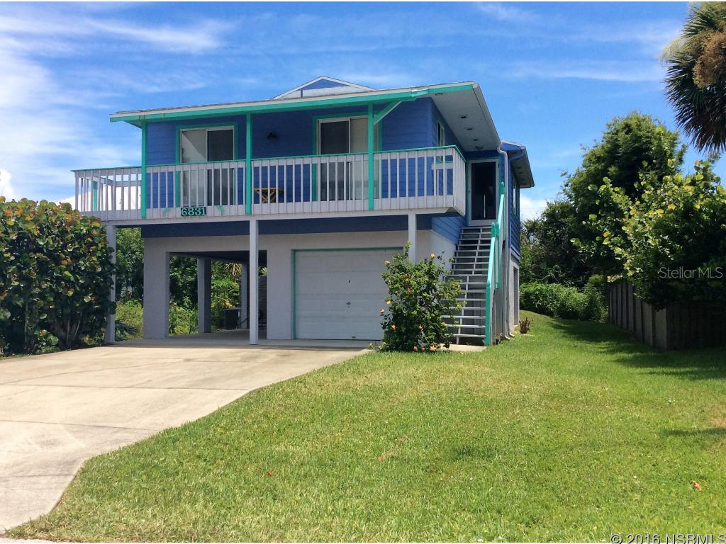 Picture perfect place to call home or for your beach get away. 2 bedroom, 2 bath in quiet neighborhood. Walk to the beach & JB's. Enjoy nearby Canaveral National Seashore Park. Launch your kayak or paddleboards from ramp within walking distance. Hardy Board siding, enclosed garage, work room, vaulted ceilings, outdoor shower, room for boat trailer and toys. New roof and a/c. Some furnishings to convey. Linens and dishes included. Artwork, kayaks, chalkboard and bikes excluded. ;Water: City