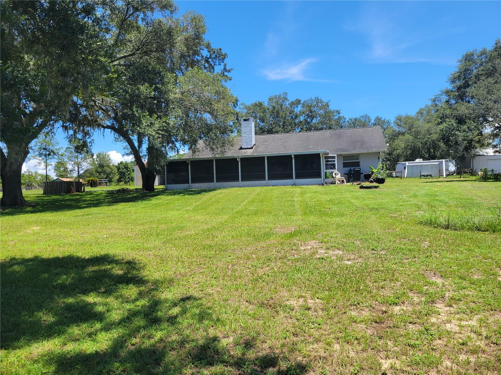 This property consists of 3 adjoining lots at the SE corner of Plymouth Sorrento road and Dowman drive, Apopka Florida.  This property is only split in 3 parcels because of Agricultual Tax purposes many years ago.   Total measurements of this property is 225 ft on Plymouth Sorrento road frontage and Dowman Drive frontage of 999 feet which is curbed and paved.  A 2 bed and 2 bath home sits on the property and is currently producing rental income.  it is 1/2 mile to the new Publix at Kelly Park and the Hwy 429 on/off ramp in the Kelly Park interchange district.  Adjacent to the Wingspan development group project that includes a mixed use concept of Restaurants, Commercial and Retail space and a planned 368 Multi Unit Apartments.