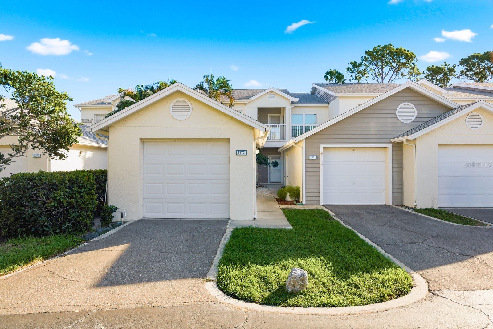 One or more photos have been virtually staged. Fully renovated, first-floor condo in one of the best communities in the Tampa Bay area, just 3 minutes to Indian Rocks Beach. This is a 2 bed, 2 bath unit with a private, detached garage, completely redone in 2025. Everything is done, flooring, paint, kitchen, bathrooms, and a brand-new A/C. It’s clean, simple, and move-in ready. The layout is open and gets great natural light. Kitchen has been updated with modern cabinets, new countertops, stainless appliances, and it flows right into the main living space. Both bathrooms have been fully remodeled with a clean, modern feel. The primary suite has a walk-in closet and its own updated bath with walk in shower. Out back, you’ve got a screened-in lanai overlooking the pond with a water sooting feature—you get both the view and the sound, perfect for relaxing with morning coffee or winding down in the evening. Shipwatch sits on 56 acres along the Intracoastal and has everything you’d expect—pools, marina access, tennis and pickleball, fitness center, walking paths, and an active community. The HOA covers almost everything including water, sewer, trash, cable, wi-fi, exterior, roof, ground maintenance, pool, tennis court membership etc. Just about everything except electric, keeping things simple and predictable. If you’re looking for something low-maintenance, flexible, close to the beach, and already fully updated—this is worth a look. Perfect for the active Florida Lifestyle.