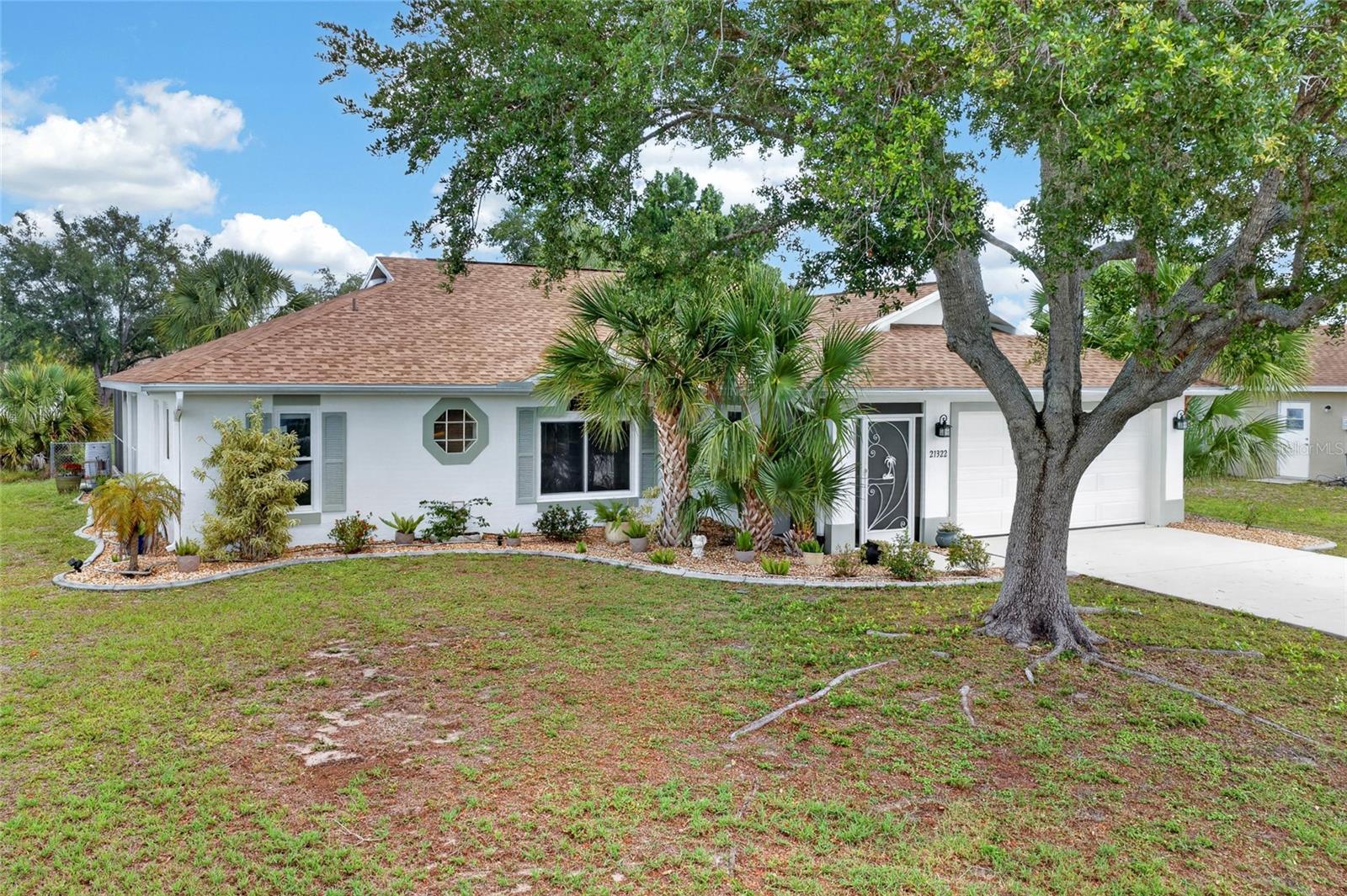 BEAUTIFULLY UPDATED POOL HOME WITH DETACHED A/C SHED AND MAJOR UPGRADES THROUGHOUT! Welcome to this meticulously maintained 3 BEDROOM, 2 BATHROOM, 2 CAR GARAGE home located in Port Charlotte, offering the perfect blend of COMFORT, FUNCTIONALITY, and PEACE OF MIND with extensive recent improvements already completed.

Step inside and immediately appreciate the TALL CEILINGS throughout the main living area, creating a bright and spacious atmosphere filled with natural light. NEW TILE FLOORING INSTALLED IN 2023 flows throughout the home, while BRAND NEW CARPETING IN ALL BEDROOMS (2026) adds warmth and comfort to the private living spaces.

The kitchen is both stylish and functional, featuring CORIAN COUNTERTOPS, a NEW BACKSPLASH (2024), and ample cabinetry and prep space perfect for everyday living or entertaining guests. The laundry room adds even more convenience with a UTILITY TUB, ideal for cleaning, projects, or additional functionality.

The LARGE PRIMARY SUITE offers a spacious retreat, while the generously sized guest bedrooms provide comfort and flexibility for family or visitors. LIGHTED WALK-IN CLOSETS throughout the home add both convenience and thoughtful functionality to the living spaces.

Step outside to your private screened pool area where recent upgrades make outdoor living even more enjoyable. The POOL DECK was REFINISHED IN 2025 with a durable FLECK + POLYSPARTAN COATING, and the NEW POOL SCREEN (2023) combined with FLORIDA GLASS SCREENING ON THE LOWER PORTION OF THE CAGE (2020) enhances both privacy and comfort.

This home also offers exceptional storm protection and peace of mind with HURRICANE IMPACT WINDOWS (2023), a HURRICANE-RESISTANT GARAGE DOOR (2024), and a NEW ROOF WITH WATERPROOF UNDERLAYMENT (2023). Additional updates include a NEW HEAT PUMP (2020). The home is also equipped with a SECURITY SYSTEM and SMART HOME DEVICES, adding modern convenience and additional peace of mind.

One of the standout features of this property is the DETACHED 13x13 INSULATED SHED complete with ELECTRIC and AIR CONDITIONING. Built and installed in 2019, this versatile space is perfect for a workshop, hobby room, home office, gym, or additional storage.

Conveniently located near shopping, dining, parks, schools, golf courses, and Gulf beaches, this move-in ready home offers both comfort and accessibility in a desirable Port Charlotte location.

Whether you're searching for a FULL-TIME RESIDENCE, SEASONAL RETREAT, or INVESTMENT OPPORTUNITY, this property delivers UPDATES, VERSATILITY, and VALUE all in one exceptional package.

Schedule your private showing today and experience everything this Port Charlotte pool home has to offer!