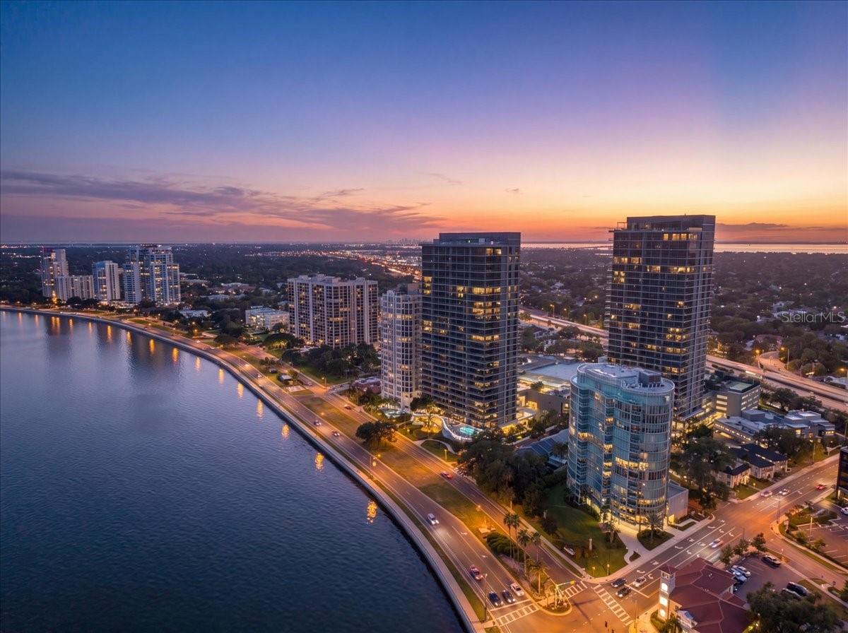 A rare opportunity awaits at Aquatica on Bayshore, one of South Tampa's most exclusive luxury addresses. As the first new high-rise built on Bayshore Boulevard since 2007, Aquatica sold out during pre-construction, making resale opportunities exceptionally rare. This boutique 32-residence tower is celebrated for its striking curved contemporary architecture, expansive walls of floor-to-ceiling impact-rated glass, and an unparalleled waterfront location along Tampa's iconic Bayshore Boulevard. While many luxury buyers are drawn to large branded towers, others are searching for something far more valuable—privacy. With just 32 residences, Aquatica offers an intimate living experience where neighbors know one another, elevators are rarely shared, common areas remain peaceful, and amenities are enjoyed without crowds. Here, residents experience the tranquility and exclusivity of a private retreat rather than the constant activity of a large luxury hotel. Exclusivity isn't defined by a brand name—it's created by the limited number of homes and the lifestyle that comes with them. Designed to maximize light, views, and livability, residences feature soaring 10-foot ceilings, open-concept floor plans, two private balconies, state-of-the-art climate control, premium Bosch stainless appliances, stone countertops, under-cabinet lighting, elegant stone flooring in the bathrooms, 8-foot solid-core interior doors, and sleek contemporary cabinetry throughout. Floor-to-ceiling windows frame breathtaking panoramic views stretching from Davis Islands across the sparkling waters of Tampa Bay to St. Petersburg, Pinellas County, and Tampa International Airport, creating a spectacular backdrop from sunrise through sunset. Residents enjoy an exceptional collection of resort-style amenities, including 24-hour concierge and security, secured lobby access with controlled elevator entry, a spectacular resort-style pool and spa, outdoor grilling and entertaining area, a state-of-the-art fitness center, sauna, business center, conference room, theater/media room, library, an elegant resident clubroom with a full catering kitchen, two fully furnished guest suites, and an on-site association office. Two assigned under-building parking spaces and climate-controlled storage add everyday convenience. Perfectly positioned at Bayshore Boulevard and Bay to Bay Boulevard, Aquatica places residents just steps from approximately 13 restaurants, many within walking distance, while providing direct access to Tampa's iconic waterfront promenade. Hyde Park Village, Downtown Tampa, the Westshore Business District, International Plaza, Tampa International Airport, and award-winning Gulf beaches are all just minutes away. Luxury is no longer about having more people around you. It's about having fewer. Private showings are available by appointment. Discover why Aquatica remains one of Bayshore Boulevard's most coveted and tightly held luxury residences.