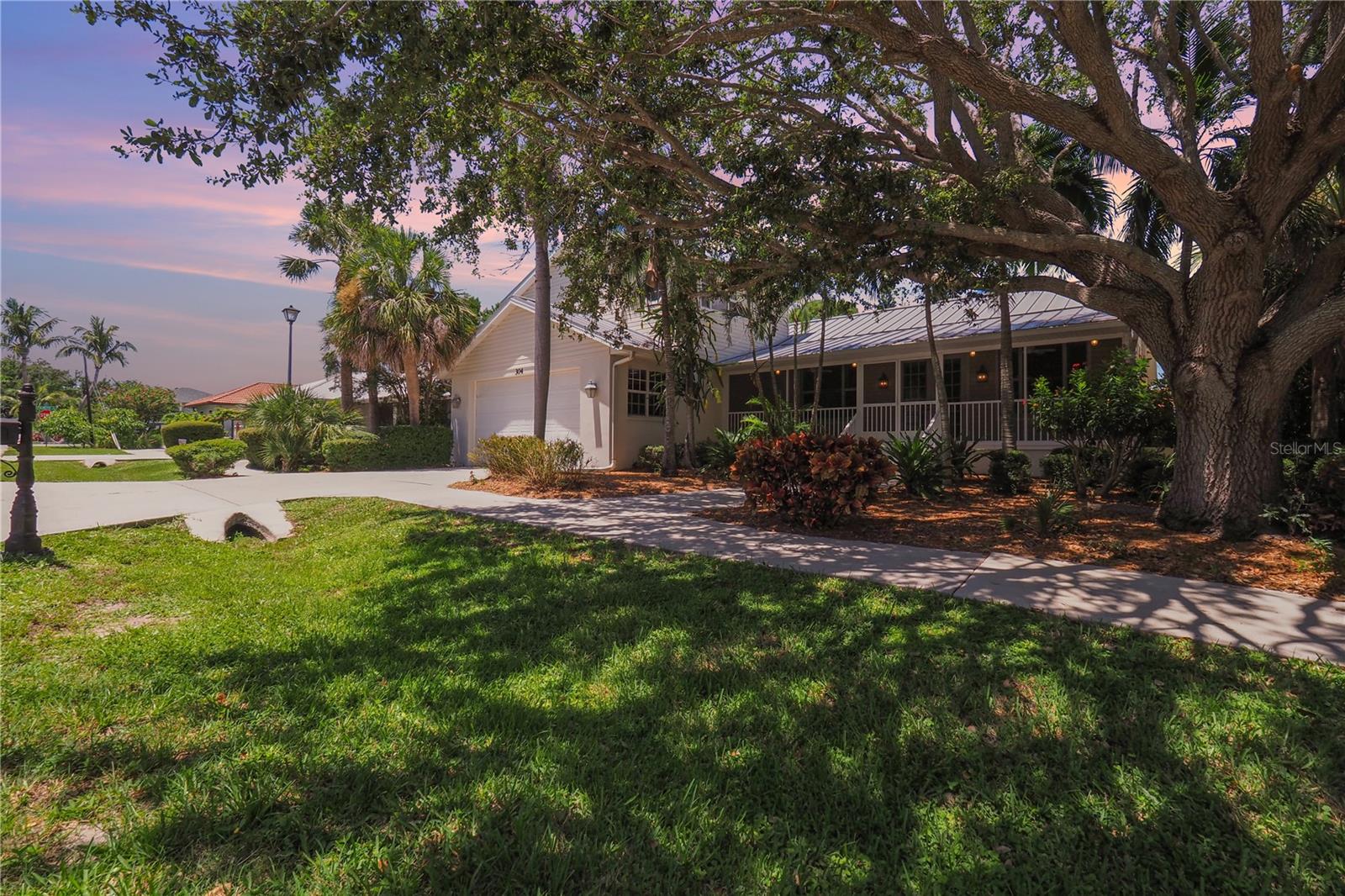 Under contract-accepting backup offers. Virtually Staged. Lakefront home. Thoughtfully designed and meticulously built, this stunning custom residence offers an open floor plan, premium finishes, and a wealth of high-end features—all set on a beautiful lakefront lot.

Built with Impact Windows & Exterior Doors, this home combines elegance with peace of mind. Additional construction upgrades include Icynene Insulation, a Standing Seam Metal Roof, and plaster crown molding throughout. The home is equipped with a whole-house generator, wood floors and 10-foot ceilings in every room, and plantation shutters for timeless charm.

The heart of the home features a true chef’s kitchen with abundant counter space and custom cabinetry. Highlights include:

Natural gas 6-burner Dacor stove with double ovens and large exhaust hood.

Sub-Zero refrigerator and freezer.

Built-in ice maker.

Bosch dishwasher (new in June 2025).

Natural gas powers the kitchen range, outdoor Altima grill, water heater, pool heater, and fireplace.

Each bedroom has its own full bathroom for comfort and privacy:

Primary Suite: Lake and pool views, French doors to the pool area, jetted tub, separate shower, bidet, and a large walk-in closet with custom shelving.

Second Bedroom: French doors to the pool with lake views.

Third Bedroom (Upstairs): Spacious suite with its own living area, compact kitchen, and full bath—ideal for guests, extended family, or a caregiver.

The open living area features a cozy fireplace, custom built-ins, and French doors leading to the pool and lakefront. The private office/den includes built-in cabinetry and French doors for quiet work-from-home space.

Enjoy Florida’s outdoor lifestyle with:

Screened front porch (8’ x 32’).

Screened pool area with large covered porch (9’ x 32’), Altima natural gas grill, and stainless-steel exhaust hood.

Heated pool (new pump in March 2025).

Deck/walkway leading to a private dock overlooking the lake—home to tilapia and abundant wildlife.

Additional Features: 

Laundry room with sink, cabinetry, and extra pantry space.

Newer A/C (May 2024) and water heater (Sept 2021).

Over 11 ft Elevation.

Conveniently located between Sarasota and Venice with easy access to beaches, I-75, shopping, and dining.

This home blends quality craftsmanship, luxury amenities, and a serene lakefront setting—perfect for both everyday living and entertaining.