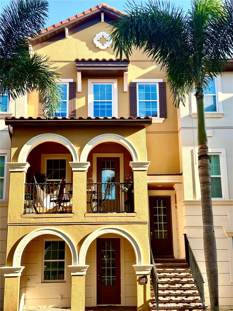 Premium location townhome located in the stylish Mediterranean-style gated community of Fountain Parke in Lake Mary. Enjoy maintenance-free living at Lake Mary! This 24 H. gated townhome community offers a resort-style pool and spa, tennis court, clubhouse, dog park, and expansive grass areas for recreational activities. Fountain Parke sits in the heart of Lake Mary with convenient access to I-4, 417, A-rated school district, and all the shopping, dining & play that Lake Mary & Historical Sanford have to offer! Welcome through the charming breezeway and ascend the paved staircase to discover a stunning 3 -level Tuscan-style retreat. The main floor boasts a beautiful open-concept design, with no back neighbors! This spacious area seamlessly integrates the gourmet kitchen with Carrara marble, dining area, and vast living room, creating an ideal space for entertaining. The living room opens onto a large, tiled balcony with ample space to relax and enjoy the serene surroundings. Across the breezeway, you’ll find a large field perfect for leisurely walks and outdoor activities. The top floor features a spacious master bedroom with an en-suite bathroom and a large closet. Additionally, there are two more bedrooms and bathrooms, and a convenient laundry area on this floor. The ground floor includes a versatile bedroom that can also serve as a tucked-away office or in-law suite, along with a half bathroom. The fourth bedroom offers direct access to the charming, paved front porch, perfect for enjoying the outdoors.
Don't miss the chance to own this exquisite home in a serene and prestigious community!