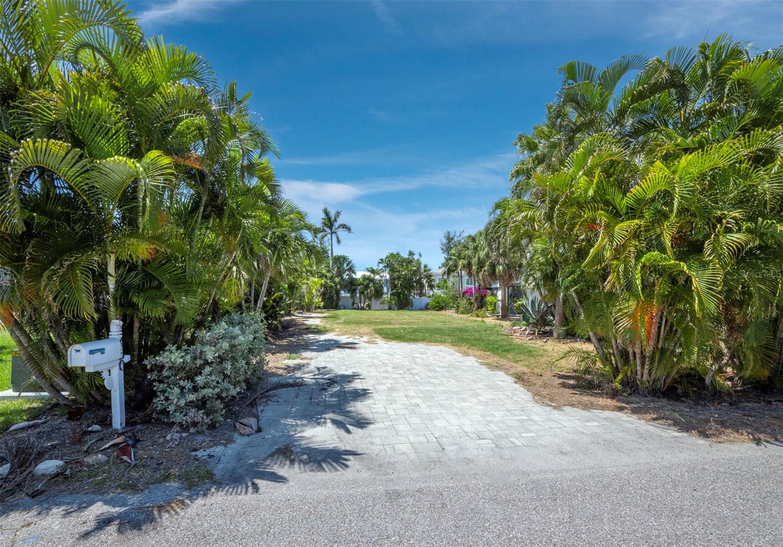 Here it is! The perfect vacant lot on Longboat Key you've been waiting to build your dreamy beach getaway on! And at a price that beats any other lot here.....Mere steps from the famous Broadway beach that stretches all the way around beer can island. Located on the beach side of Gulf of Mexico drive on the sought after north end of Longboat Key, this is the epitomy of island living. A short walk, bike or golf cart ride across Gulf of Mexico brings you to multiple restaurants, shopping, the community dock with a boat ramp, two work out facilities, the liquor store.....what more do you need? And if you said, I need house plans, the current owner already has some you may be interested in OR put your ideas to work and build your own. This won't last. If this interests you, you need to check it out quickly!