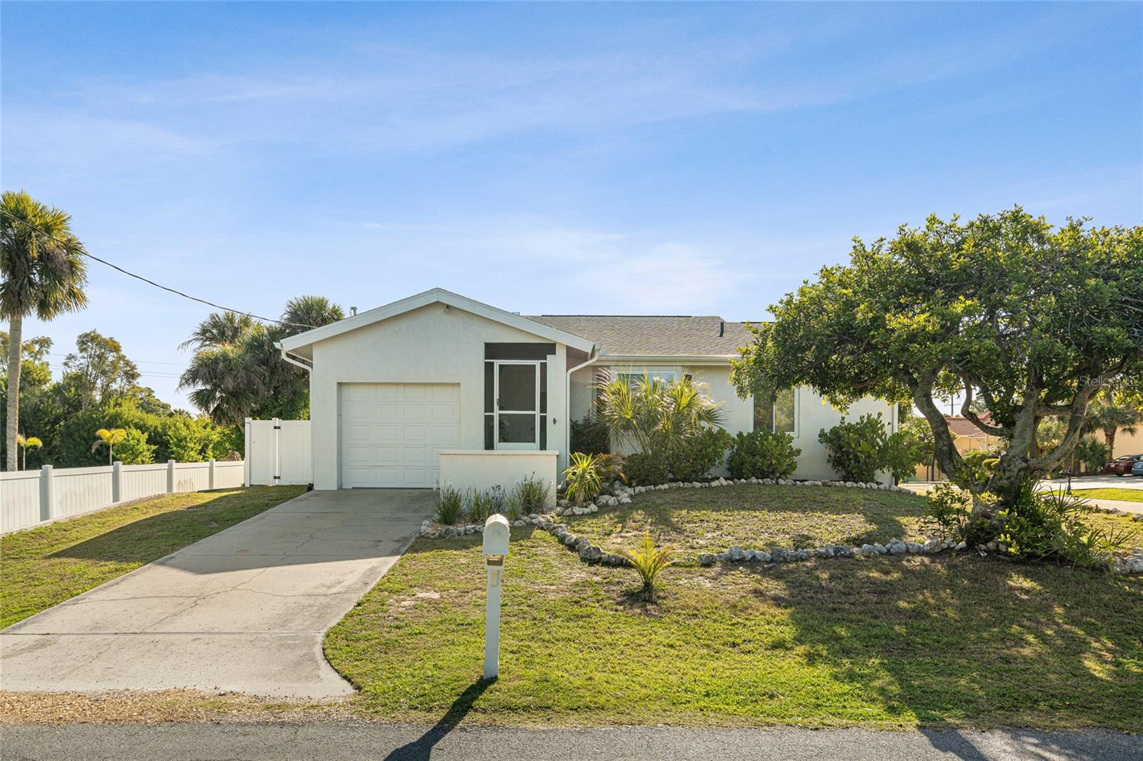 Welcome to this stunning and updated concrete block home, West of the Trail in Nokomis! **No flooding through any storm - home is elevated!** This beautiful property boasts an array of impressive features that are sure to capture your attention. Situated on a corner lot and conveniently located near all the amenities you desire. **No HOA and No Deed Restrictions** With a spacious floor plan spanning 1,540 square feet, there's plenty of room for both relaxation and entertainment. Step inside and be greeted by the warm and inviting atmosphere that permeates throughout the entire home. The layout ensures maximum privacy, allowing you to unwind and enjoy your own personal oasis. The two bedrooms provide ample space for comfortable living, each offering a peaceful retreat after a long day. Updated bathrooms feature new vanities that exude elegance, while the tastefully updated kitchen showcases modern finishes such as granite counters, subway tile backsplash and fantastic appliances. Prepare culinary delights with ease and style in this well-appointed kitchen. **New Roof in 2022/2023** **Hurricane Impact Windows** **A/C 2024** **Vinyl Fence 2021** As you explore further, you will notice the fresh flooring in select rooms, adding a touch of sophistication to the overall aesthetic. The vinyl fence surrounding the property offers both security and privacy, allowing you to fully enjoy your outdoor space. Located in Nokomis, this home provides easy access to nearby shopping centers, restaurants, parks, and stunning beaches. Enjoy the best that Florida has to offer just moments from your doorstep. Don't miss out on this incredible opportunity to own a beautifully updated home that truly is move in ready. Schedule a showing today and make this property your own! **THIS PROPERTY QUALIFIES FOR A 1% LENDER INCENTIVE IF USING PREFERRED LENDER. INQUIRE FOR MORE DETAILS.**