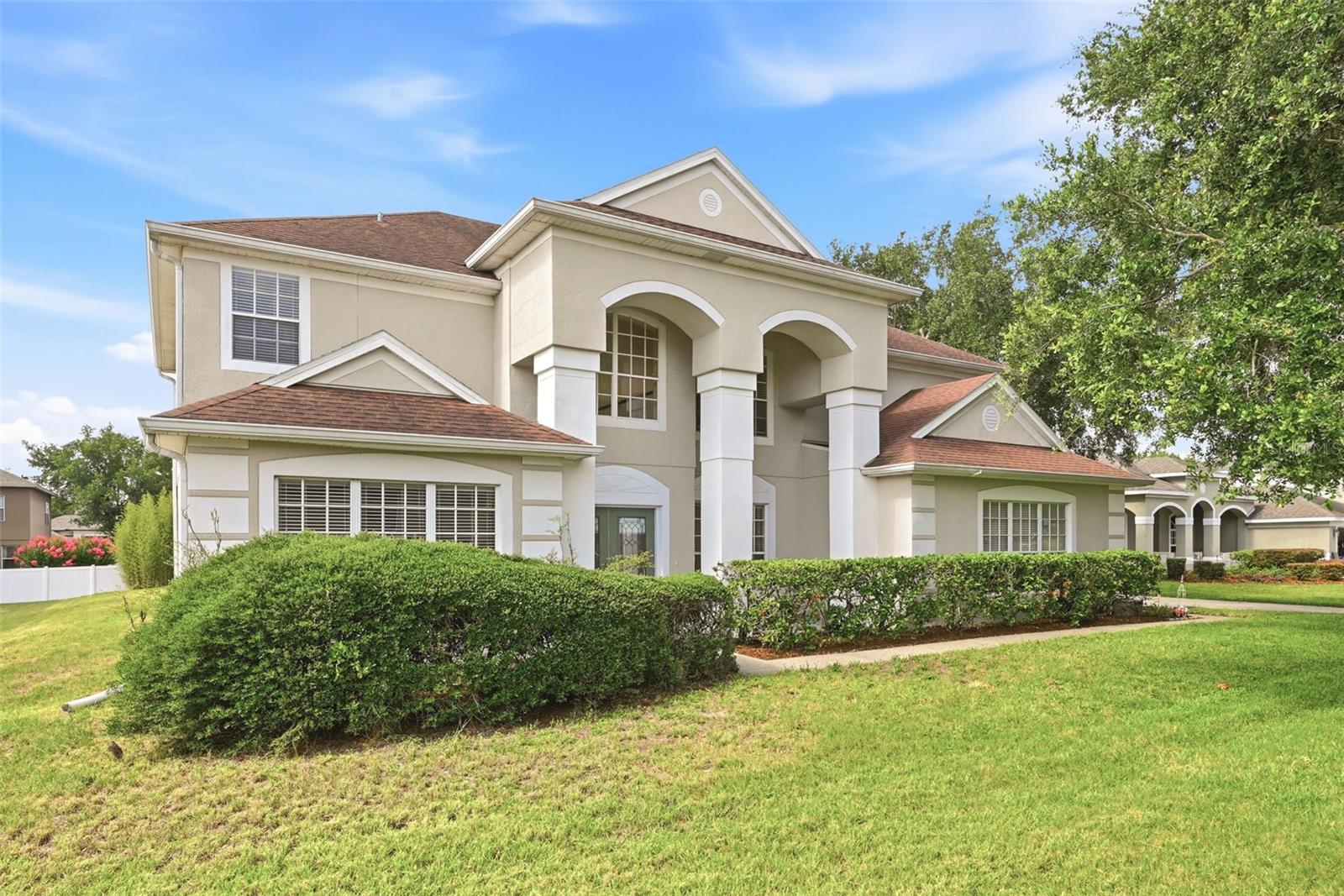 Welcome to this beautifully maintained 5-bedroom, 3.5-bath home located in the desirable gated community of Windermere Chase, ideally positioned on a quiet corner of a looped street that offers exceptional privacy and minimal traffic. From the moment you arrive, you’ll appreciate the home’s open, airy setting, facing a large community green space that creates a bright, unobstructed front view.

Inside, the thoughtfully designed floor plan features bamboo flooring throughout the main downstairs living areas and spacious rooms filled with natural light. The well-appointed kitchen offers stainless steel appliances, ample cabinetry, and generous workspace, now enhanced with a true exterior-exhaust kitchen range hood and a Reverse Osmosis (RO) water filtration system for pure drinking water.

Modern efficiency and wellness are woven throughout the home, featuring a whole-house water softener system and upgraded R-38 attic insulation package designed to maximize climate control and energy efficiency.

The primary suite is conveniently located on the first floor and includes a large walk-in closet and private bath. Also downstairs is a dedicated office, ideal for working from home. Upstairs, four additional bedrooms and a large bonus room provide flexible space for a media room, playroom, or second living area.

Step outside to enjoy the expansive backyard, which offers a rare combination of openness and privacy. The home backs directly to a large community retention pond, creating peaceful views and a tranquil outdoor setting ideal for relaxing or entertaining.

With its prime Gotha location, excellent neighborhood amenities, and thousands in high-end mechanical upgrades, this move-in-ready home offers comfort, privacy, and efficiency in one outstanding package.