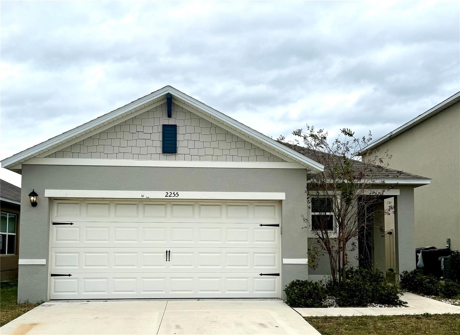 Beautiful 2023-built single-family home located in the desirable Thompson Grove community. This well-maintained residence features an open-concept floor plan with a bright and spacious living area that flows seamlessly into the modern kitchen, complete with stainless steel appliances, a pantry, ample cabinetry, and generous counter space. A convenient half bath is located on the first floor for guests. The air-conditioned garage offers a versatile space ideal for a home gym, workshop, hobby area, or additional storage. Conveniently located near shopping, dining, parks, schools, and major commuter routes, this move-in-ready home combines modern design with everyday functionality.