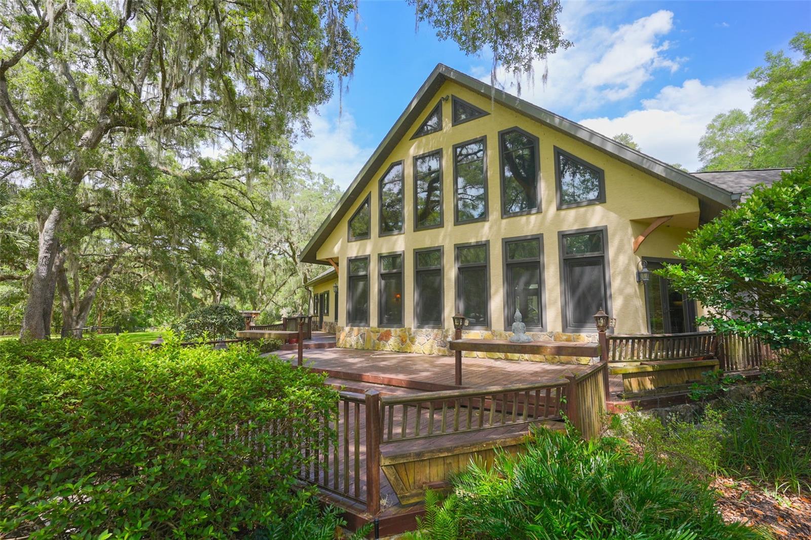 Experience the ultimate blend of luxury living, equestrian lifestyle, and income-producing potential at this exceptional equestrian property in Ocala, Florida. With 10 acres in the heart of Marion County's world-famous horse country, this turnkey property offers a rare opportunity to own a successful short-term rental property near the World Equestrian Center while enjoying resort-style amenities and premier horse facilities.

Designed to appeal to equestrian enthusiasts, vacation travelers, and real estate investors alike, this stunning property features a beautifully appointed main residence, a barn with studio apartment, horse turnout as well as additional amenities that consistently attract Airbnb and vacation rental guests seeking an authentic horse country experience.

The property's resort-inspired outdoor living spaces set it apart from competing equestrian properties. Guests and owners can relax in the sparkling swimming pool and unwind in the private hot tub on a spacious screened in patio. These sought-after amenities enhance both lifestyle enjoyment and short-term rental appeal.

Equestrian facilities include perimeter and cross fencing, horse turnout areas, and a functional barn complete with a private studio apartment. The studio provides flexible accommodations for trainers, caretakers, guests, or additional rental income opportunities. Whether you're seeking a private horse property, a rental investment property, or an equestrian retreat near Ocala's premier competition venues, this property offers exceptional versatility.

Located just minutes from the World Equestrian Center, HITS Ocala, and countless riding trails, this property is ideally positioned for horse owners, competitors, and travelers searching for luxury equestrian accommodations in Ocala. Its established short-term rental history, combined with premium amenities and horse facilities, creates a compelling opportunity for buyers seeking both lifestyle and revenue potential.

Property Highlights:
Ten acres in Ocala's renowned horse country
Proven short-term rental income opportunity
Luxurious swimming pool and private hot tub
Barn with studio apartment
Horse paddock
Mature oak trees and picturesque countryside setting
Ideal for equestrians, investors or vacation rental operators
Eight miles from the World Equestrian Center 
Turnkey opportunity combining luxury living with income potential

If you're searching for a horse property with a pool, hot tub, rental income potential, and equestrian facilities near the World Equestrian Center, 1025 NW 150th Ave offers a unique opportunity to own one of Ocala's most desirable lifestyle and investment properties.