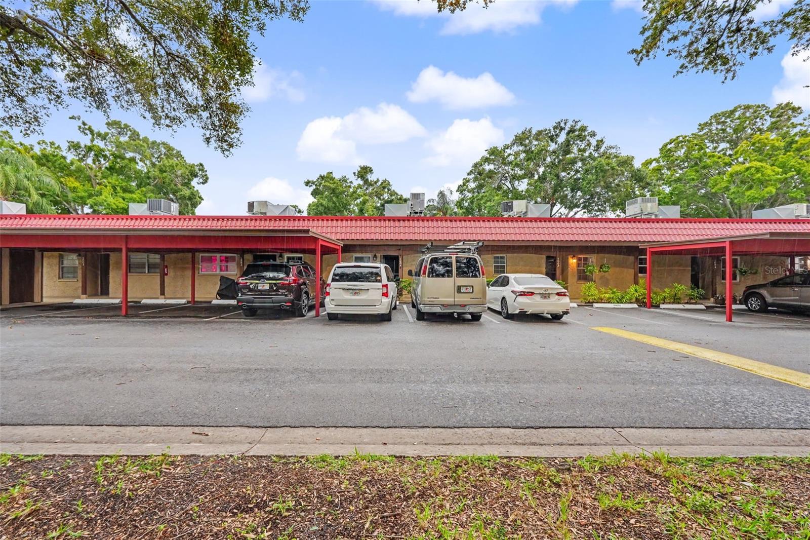 Welcome to your slice of Florida paradise in the highly sought-after 55+ active community of Pinewood Village! This charming and low-maintenance 1-bedroom, 1-bathroom condo offers the perfect blend of comfort, convenience, and affordability right in the heart of Clearwater. Whether you are looking for a full-time residence or a sunny winter getaway, this fantastic ground-floor unit is an incredible opportunity. Step inside to a bright, inviting living space with plenty of natural light. The floor plan seamlessly connects the living and dining areas, making it a great space to relax or entertain guests. The spacious bedroom features a generous walk-in closet and easy access to the full bathroom. One of the best perks of this unit is the convenience of an in-unit washer and dryer. You will also appreciate having an assigned, covered carport space located just steps from your front door, along with an outside private storage unit for your beach gear and extras. Living in Pinewood Village means embracing a resort-style, maintenance-free Florida lifestyle! The community boasts a beautifully maintained heated swimming pool, perfect for year-round enjoyment. The vibrant clubhouse is the social heart of the neighborhood, offering a billiards table, ping pong, shuffleboard courts, and a calendar full of weekly planned activities and events to keep you engaged with friendly neighbors. Enjoy worry-free living with a comprehensive HOA that covers water, sewer, trash collection, exterior building maintenance, landscaping, basic cable, and access to all community amenities.