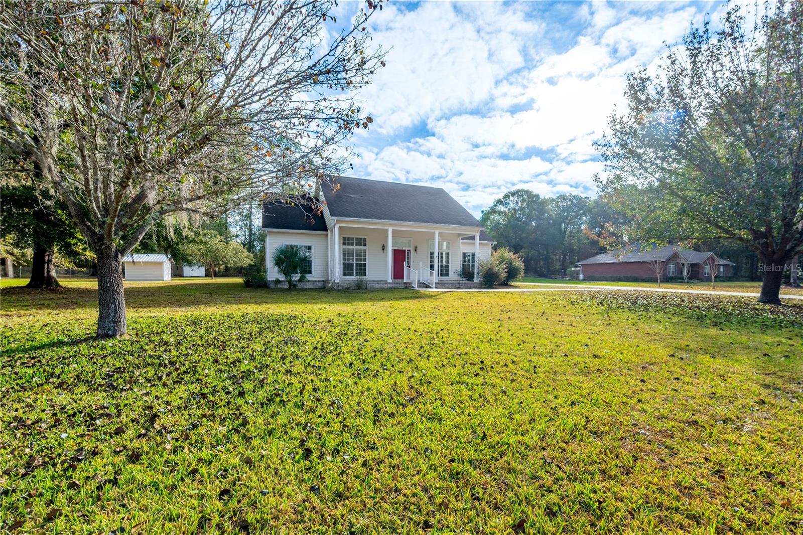Welcome to your own peaceful retreat in Starke! This beautifully updated 4-bedroom, 2 and 1/2 bath home offers the perfect blend of comfort, function, and Florida charm. Situated on a spacious 1 acre lot, it provides room to spread out — whether you’re hosting a backyard BBQ, gardening, or simply enjoying quiet evenings under the stars. Inside, you’ll find a bright and inviting layout with a bonus heated and cooled flex room that’s ideal as a home office, craft room, playroom, or whatever fits your lifestyle best. The living spaces are warm and welcoming, the bedrooms are well-sized, and the kitchen offers plenty of storage for cooking and entertaining with ease. Located in a quiet area yet still just a short drive to shopping, dining, schools, and easy commuting routes — you get the best of convenience and privacy. ONLY 45 minutes to UF and 1 hour to JAX airport. Perfect location to get to the beaches, airport, UF or just stay and enjoy Starke!
