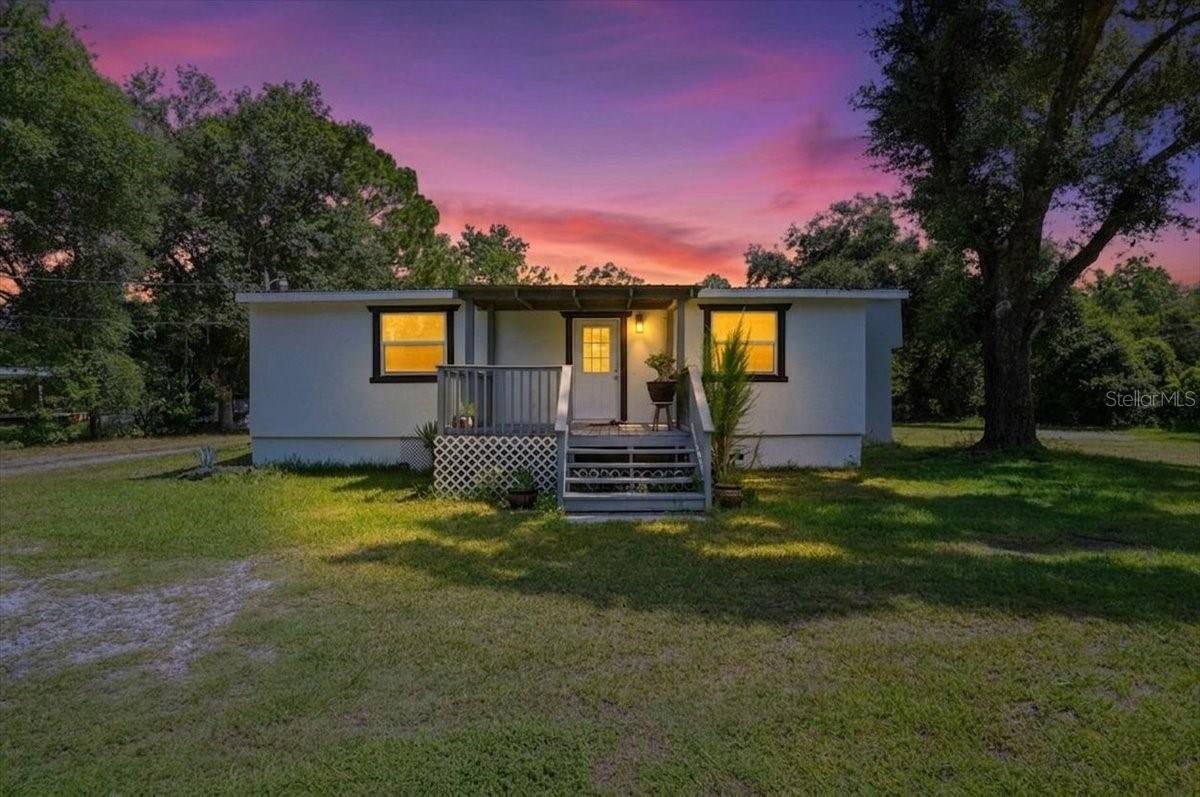 COUNTRY LIVING WITH MODERN UPDATES ON 2.47 ACRES!

Welcome to 303 Wildlife Trail, a beautifully remodeled 3-bedroom, 2-bath home situated on 2.47 private acres in Lakeland. If you've been searching for space, privacy, and peace of mind, this property delivers.

Approximately five years ago, the home underwent an extensive renovation, including the roof, A/C system, electrical panel, plumbing, well, septic system, water softener, flooring, kitchen, and bathrooms. The result is a move-in-ready home with modern finishes and major systems already updated.

Inside, you'll find an open-concept layout with luxury vinyl flooring throughout, a spacious living area, updated lighting, and a beautifully renovated kitchen featuring granite countertops, ample cabinetry, and stainless steel appliances. The generously sized primary suite offers plenty of room to relax, along with a large walk-in closet.

Outside, enjoy nearly 2.5 acres of usable land surrounded by mature trees, offering endless possibilities for gardening, recreation, animals, equipment storage, or simply enjoying the Florida lifestyle.  This property provides the flexibility and freedom that are increasingly hard to find.

Conveniently located near shopping, dining, schools, and major roadways while maintaining the privacy and charm of country living.

Schedule your private showing today.