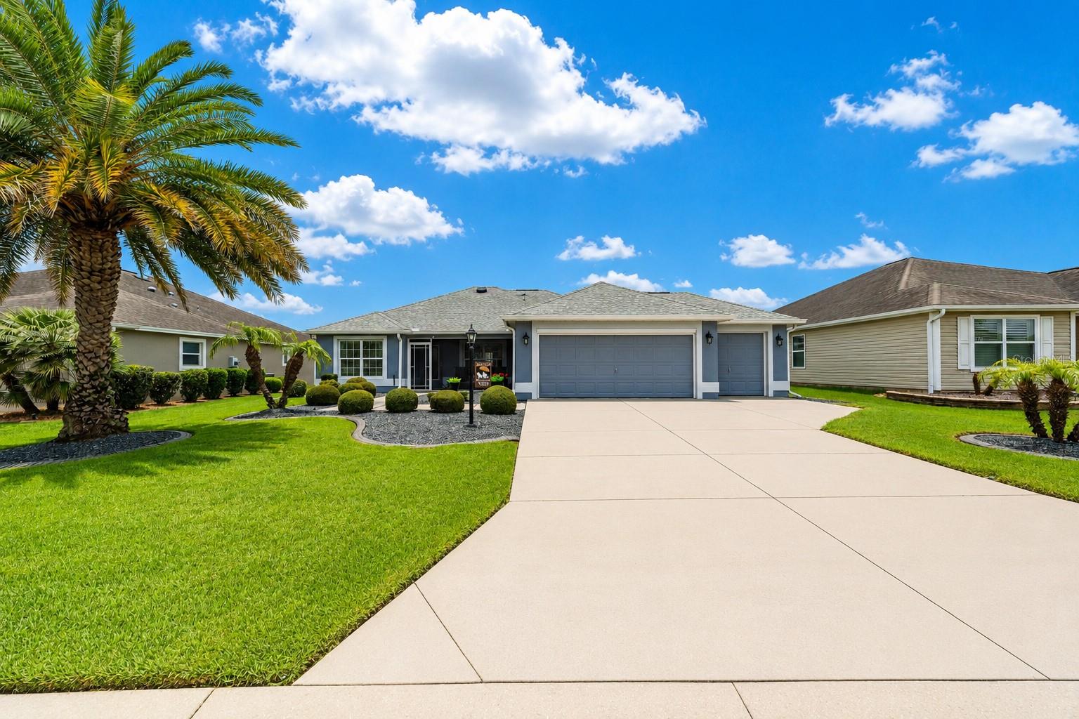 If you are looking for a block and stucco home with a golf cart garage, this home is for you! This 3/2 Allamanda located in the Village of Dunedin has lots of updates that you will appreciate. As you walk up to the home, you will notice the nice rock landscaping and screened front porch. Enter through the leaded glass front door, you will notice the vaulted ceilings and tiled floor. There is a Florida Room with access to a glass enclosed lanai with remote shades and thermal pane windows. There is also a separate covered screened lanai with a fan and light where you can grill. The kitchen has high definition laminate with a brand new backsplash. There is under cabinet lighting and a brand new glass top range and stainless appliances. The counter bar has extra storage. The living room and dining room are tiled. The dining room table and chairs and the buffet are included with the home. The primary bedroom has tile flooring, two walk-in closets and the bathroom has dual sinks and a step-in shower. This split floorplan has a privacy slider which gives the guest rooms added privacy. Both guest rooms have carpet, built-in closets and ceiling fans. One guest room includes a queen bed with small table and the other includes a king bed, two nightstands with lamps and a dresser. The guest bath has a shower/tub combination. The laundry is located inside the home and includes a utility sink. The garage is climate controlled with a mini split, has epoxy flooring, pull-down stairs, solar fan, double insulated garage doors and a water softener. There is also an electric screen on the garage. The outside of this home was newly painted in 2020. The roof was sealed in January 2024. HVAC 2022 and the water heater is original. Taxes $2,401.06, Fire $320.71, Maintenance $605.49, Annual Bond Payment $1,167.69 and the Bond Balance is $13,922.16.