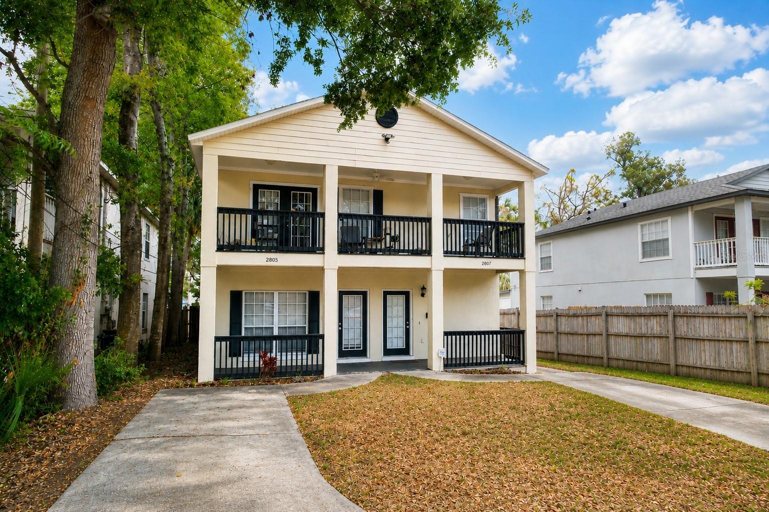 THE MILK DISTRICT DUPLEX // Exceptional investment opportunity in the heart of Orlando! This well-maintained duplex at 2805 + 2807 E Washington St features two spacious 2-bedroom, 2-bathroom units, offering an ideal setup for investors or owner-occupants looking to generate rental income. Both units currently have tenants in place, making this a fantastic turnkey investment opportunity if needed. Please note that ample notice is required for all showings.

Both units have inside laundry closets equipped with full-size washers and dryers that convey with the sale. The first-floor unit has a NEW Refrigerator and Dryer JUST replaced (after photos were taken).

Major updates provide peace of mind, including a newer roof installed in 2019 and both hot water heaters replaced in 2025. Additional highlights include a sprinkler system servicing the front and side yard, a storage shed located within the lanai area, and a second outdoor storage shed perfect for landscaping and yard equipment.

Perfectly positioned just minutes from Orlando’s vibrant Milk District, you’ll love being close to local favorites like Otto's High Dive, Sideward Brewing, Milkhouse, Gringos Locos, and Sportstown, with endless dining, nightlife, and entertainment options nearby. You’re also conveniently located near Colonial Plaza for all your shopping needs and just minutes from Lake Eola Park and downtown Orlando. This prime location combined with solid property updates makes this duplex an incredible opportunity with strong rental potential and long-term value. Contact us for a showing today!