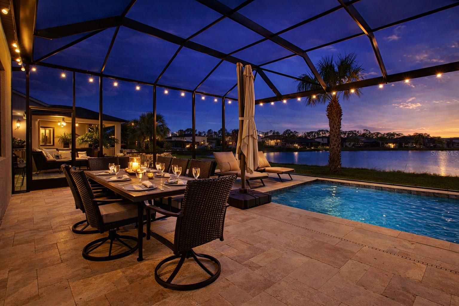 STUNNING LAKEFRONT POOL HOME IN CEDAR GROVE – 5 BEDROOMS | 3 BATHS | FLOOD ZONE X

Discover Florida living at its finest in this move-in ready lakefront pool home located on a quiet cul-de-sac in the highly desirable Cedar Grove community of North Port. Built in 2016 and offering approximately 3,542 total square feet, this spacious residence combines comfort, functionality, and exceptional outdoor living.

Located in Flood Zone X, where flood insurance is currently not required by most lenders, this property offers added peace of mind and potential savings.

Step inside to an inviting open-concept floor plan featuring soaring ceilings, abundant natural light, decorative architectural details, fresh interior and exterior paint, Ethernet wiring throughout, and multiple living spaces perfect for both everyday living and entertaining.

The chef-inspired kitchen is the heart of the home and showcases granite countertops, stainless steel appliances, a large center island, spacious walk-in pantry, new refrigerator, and induction convection self-cleaning range. The kitchen seamlessly flows into the great room and opens to the screened lanai overlooking the lake and heated pool.

The flexible floor plan offers 2 bedrooms on the first floor and 3 bedrooms upstairs, ideal for multi-generational living, guests, or a home office setup. The first-floor owner's suite features a spacious walk-in closet, dressing area, and private ensuite bath. Upstairs, a large loft provides endless possibilities as a media room, game room, home office, fitness area, or playroom.

Step outside and enjoy your own private tropical retreat featuring:

• Custom heated swimming pool
• Aluminum screened pool enclosure
• Beautiful lake views
• Mature palm trees
• Bougainvilleas
• Banana trees
• Producing mango tree

Additional upgrades include:

• Epoxy-coated garage floor
• New garage door opener with battery backup
• Generator pre-wire system
• Portable generator and connection cable included
• Steel overhead garage storage racks
• Rare additional parking space

Residents of Cedar Grove enjoy access to community amenities including a heated community pool, fenced playground, restrooms, and direct mail delivery service. HOA fees remain attractive because homeowners maintain their own lawns.

Conveniently located near I-75, shopping, dining, golf courses, medical facilities, Wellen Park, downtown Venice, and world-famous Gulf Coast beaches including Siesta Key Beach.

Whether you're looking for a primary residence, seasonal Florida retreat, or spacious family home, this exceptional lakefront pool property offers the lifestyle you've been searching for.

Easy to show. Quick closing available. Schedule your showing today!