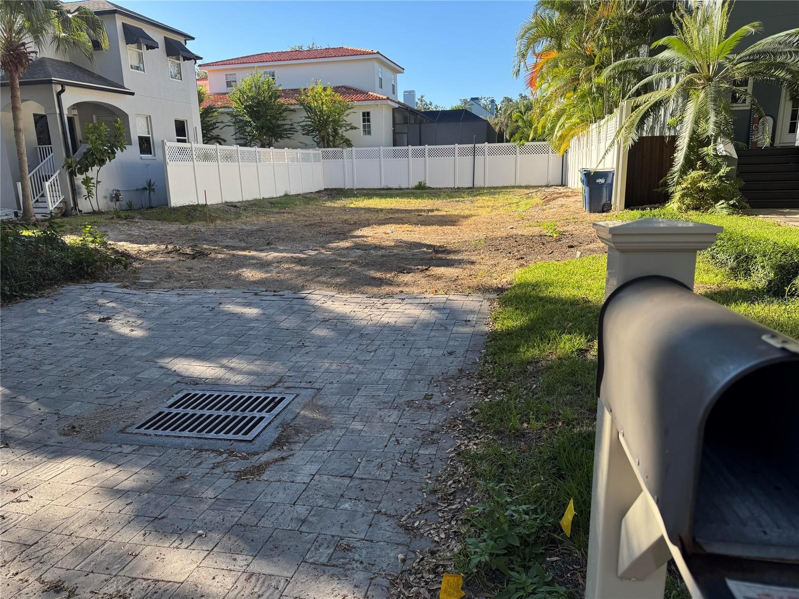Construction-ready South Tampa homesite with proposed luxury home plans in the final phase of permitting.

50 x 100 lot
No history of flooding 

Located at 2705 W Bay Ave, Tampa, FL 33611, this cleared and fenced 5,000-square-foot lot presents a rare opportunity to skip months of planning and move directly toward construction. The existing residence has been removed, and professionally designed plans for a stunning custom home are currently in the final permitting phase.

Situated among luxury new construction and mature oak-lined streets, the property is an exceptional opportunity for builders, investors, or future homeowners seeking a streamlined path to a custom residence in one of South Tampa's most desirable neighborhoods.

The lot features existing vinyl privacy fencing and is conveniently located near Bayshore Boulevard, Ballast Point, downtown Tampa, top-rated schools, shopping, dining, and waterfront amenities.

Flood Zone AE. Currently in last phase of permitting for 3,000 sq ft home.

Rare opportunity to acquire a nearly shovel-ready South Tampa homesite with substantial pre-development work already completed.